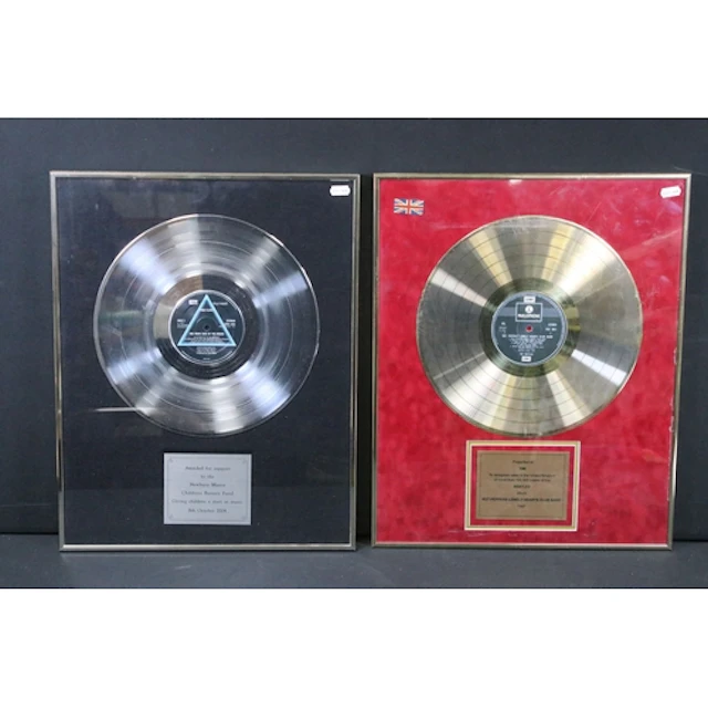 Memorabilia - Two framed and glazed presentation discs to in...