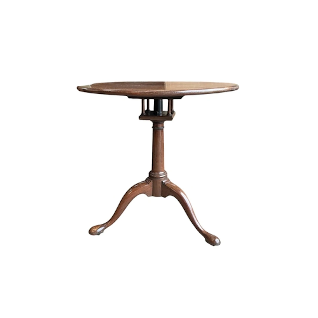 A George III mahogany tripod table with birdcage support, di...