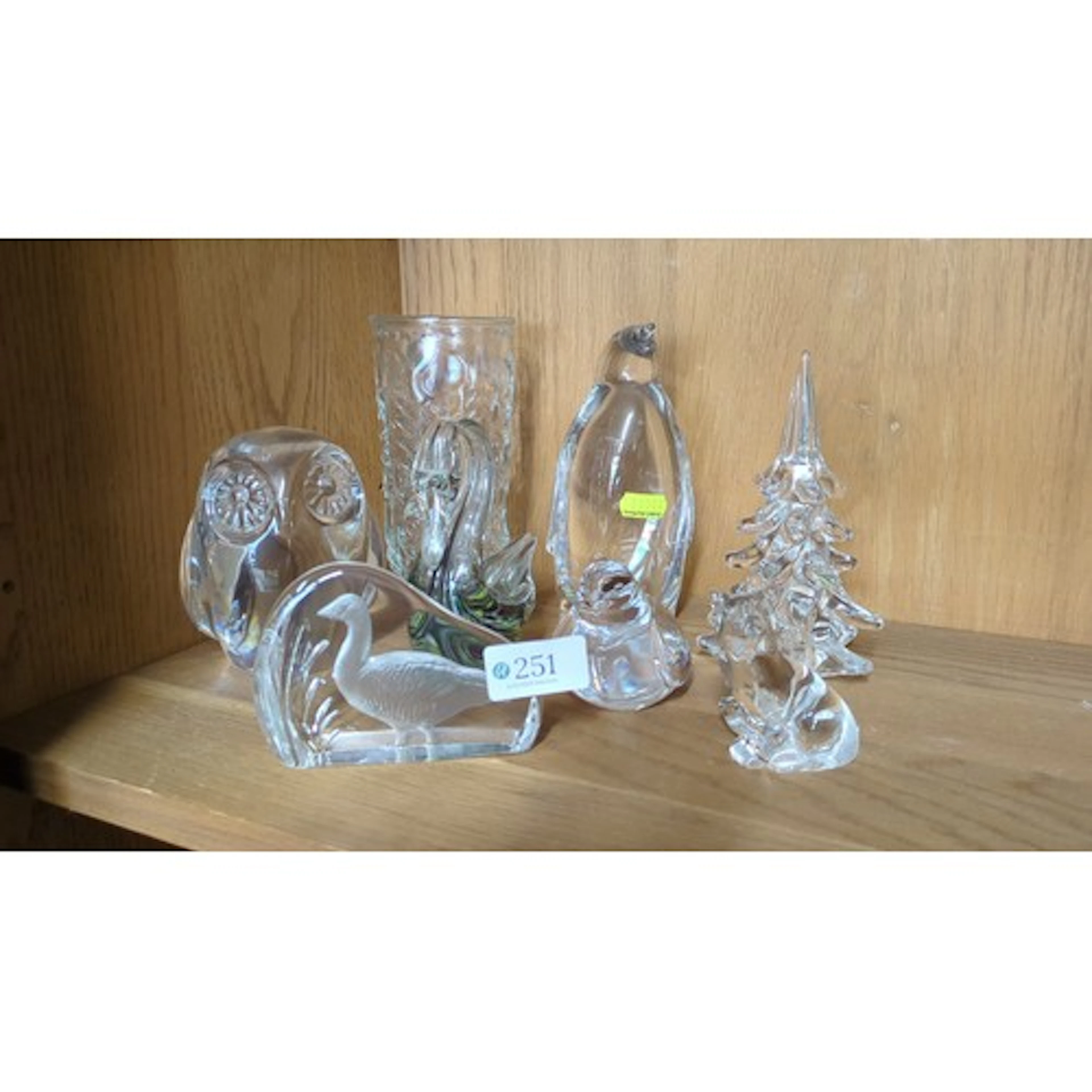 A group of clear and coloured art-glass ornaments, including...