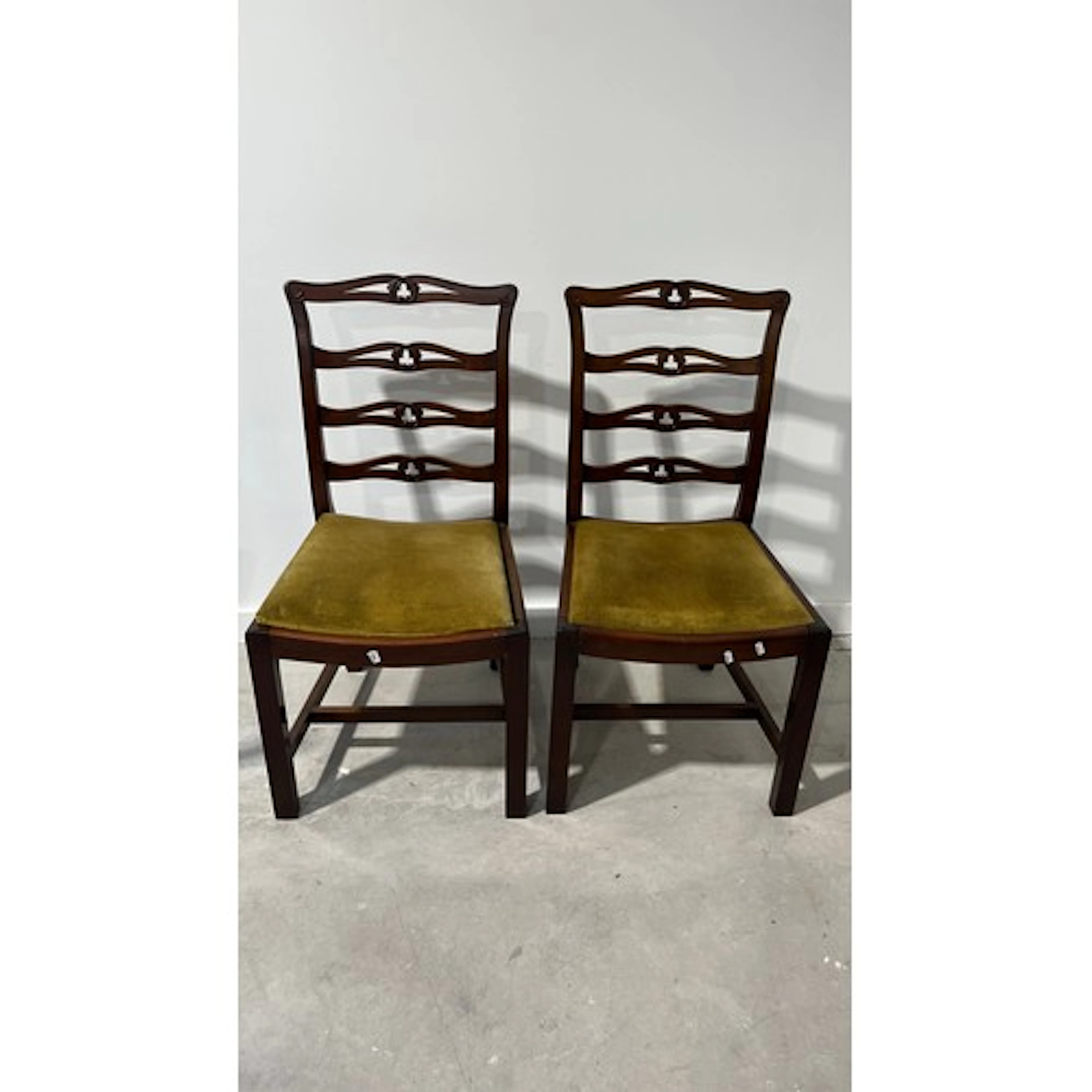 Pair of upholstered dining chairs.