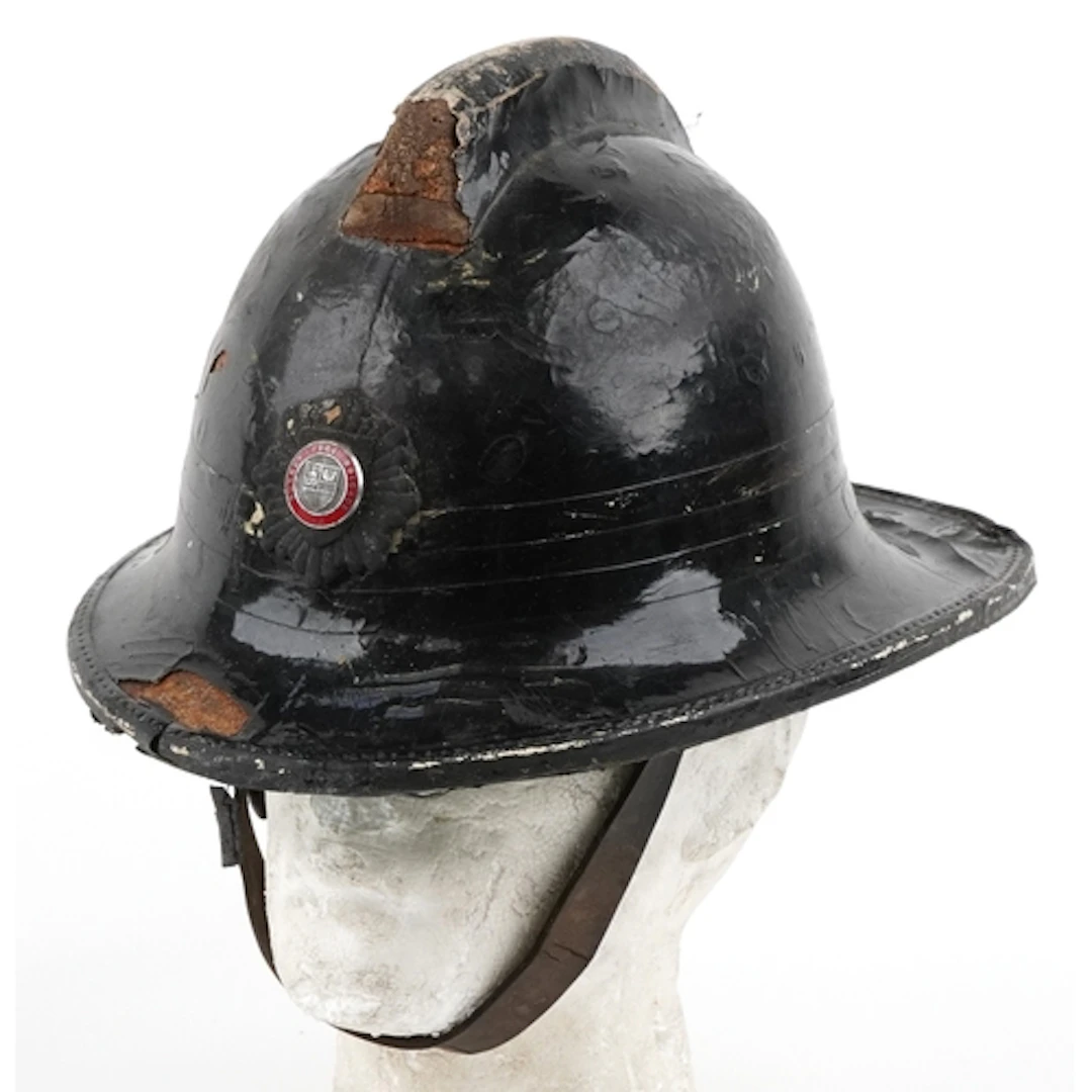 Vintage Cork firemen's helmet with enamelled Surrey Fire Bri...