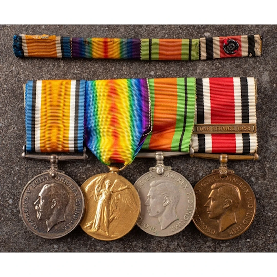 A WWI/WWII group of four to '47961 Pte W Bromley Manch R' Wa...