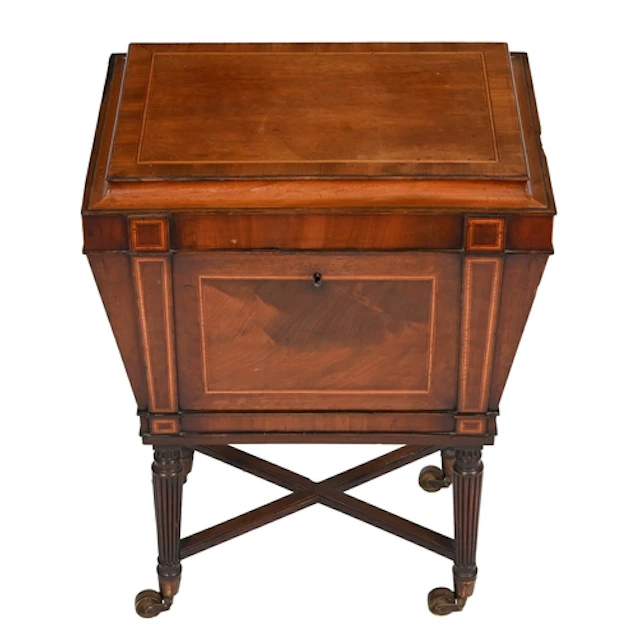 A Regency mahogany and satinwood line inlaid cellarette, of ...