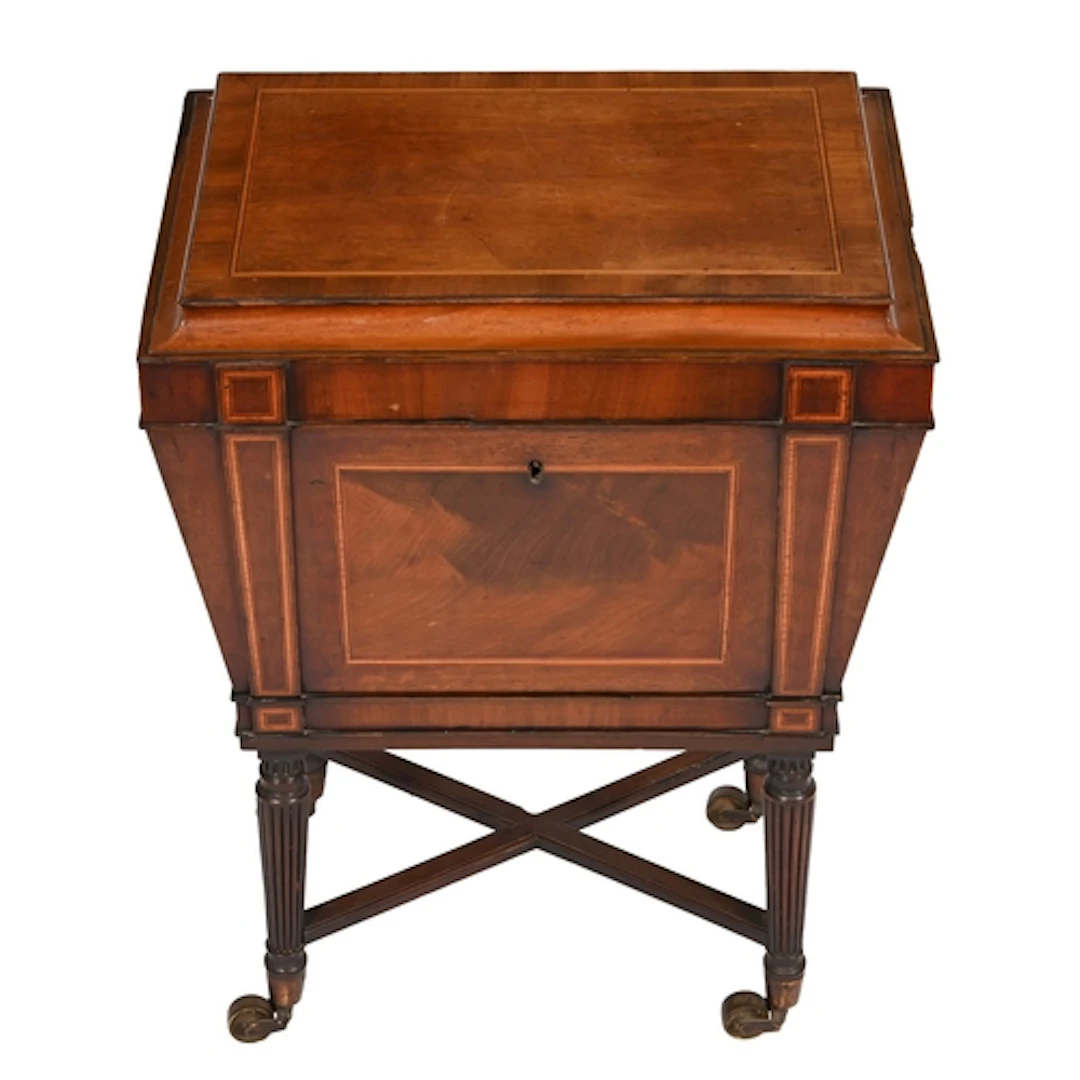 A Regency mahogany and satinwood line inlaid cellarette, of ...