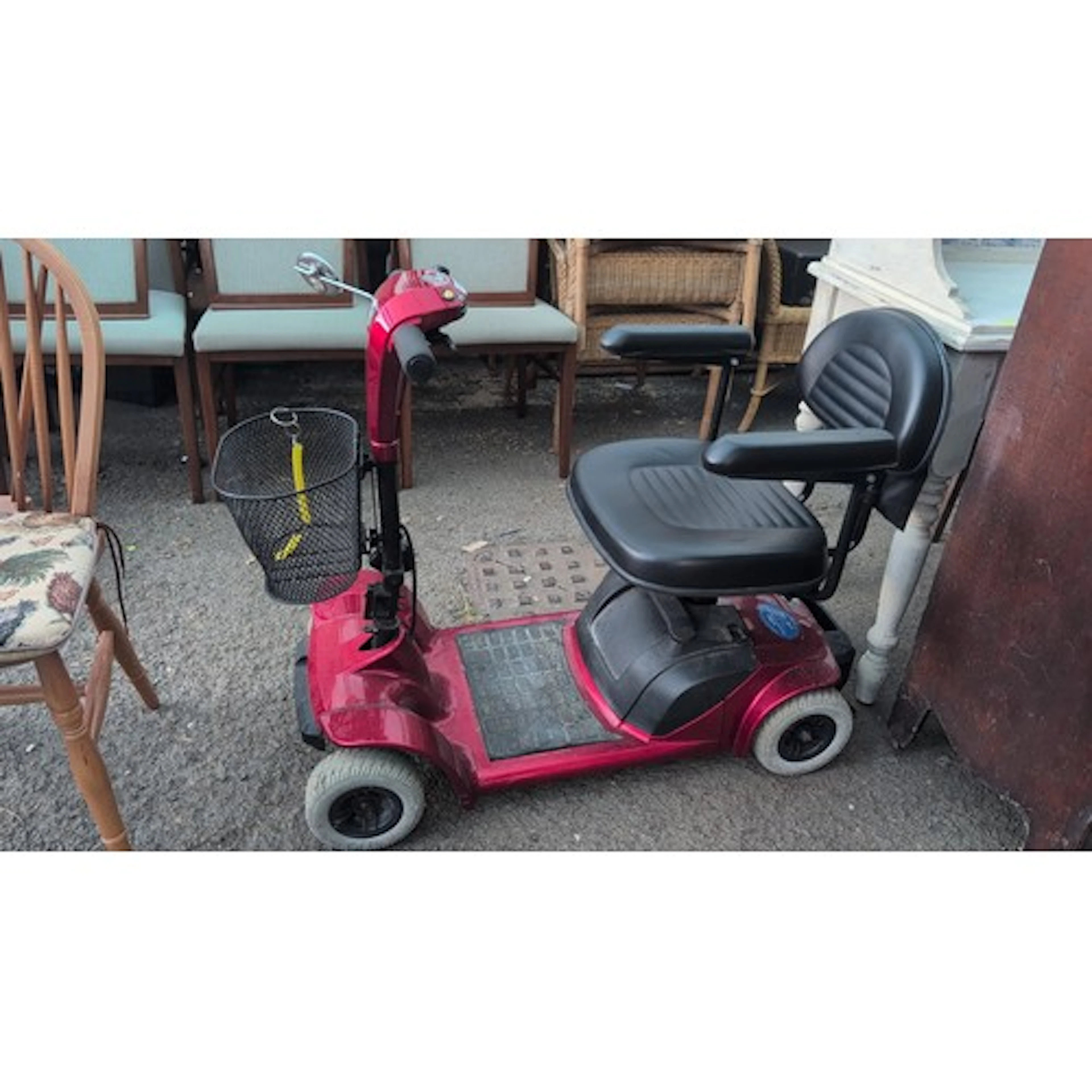 Rascal Taxi 4 mobility scooter in metallic red, with padded ...