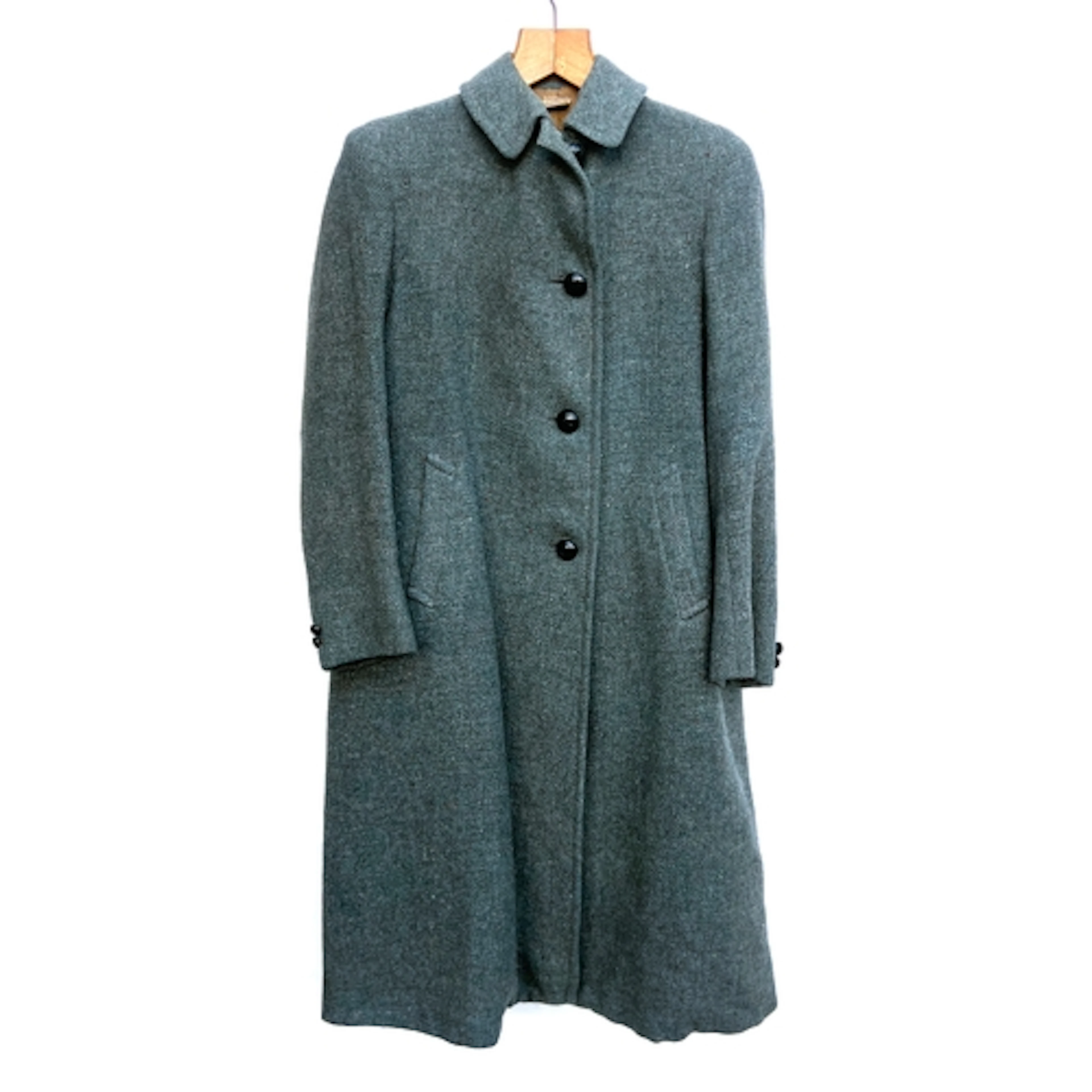 A 1940s Lovat green wool coat tailored by J & E Russell Coll...