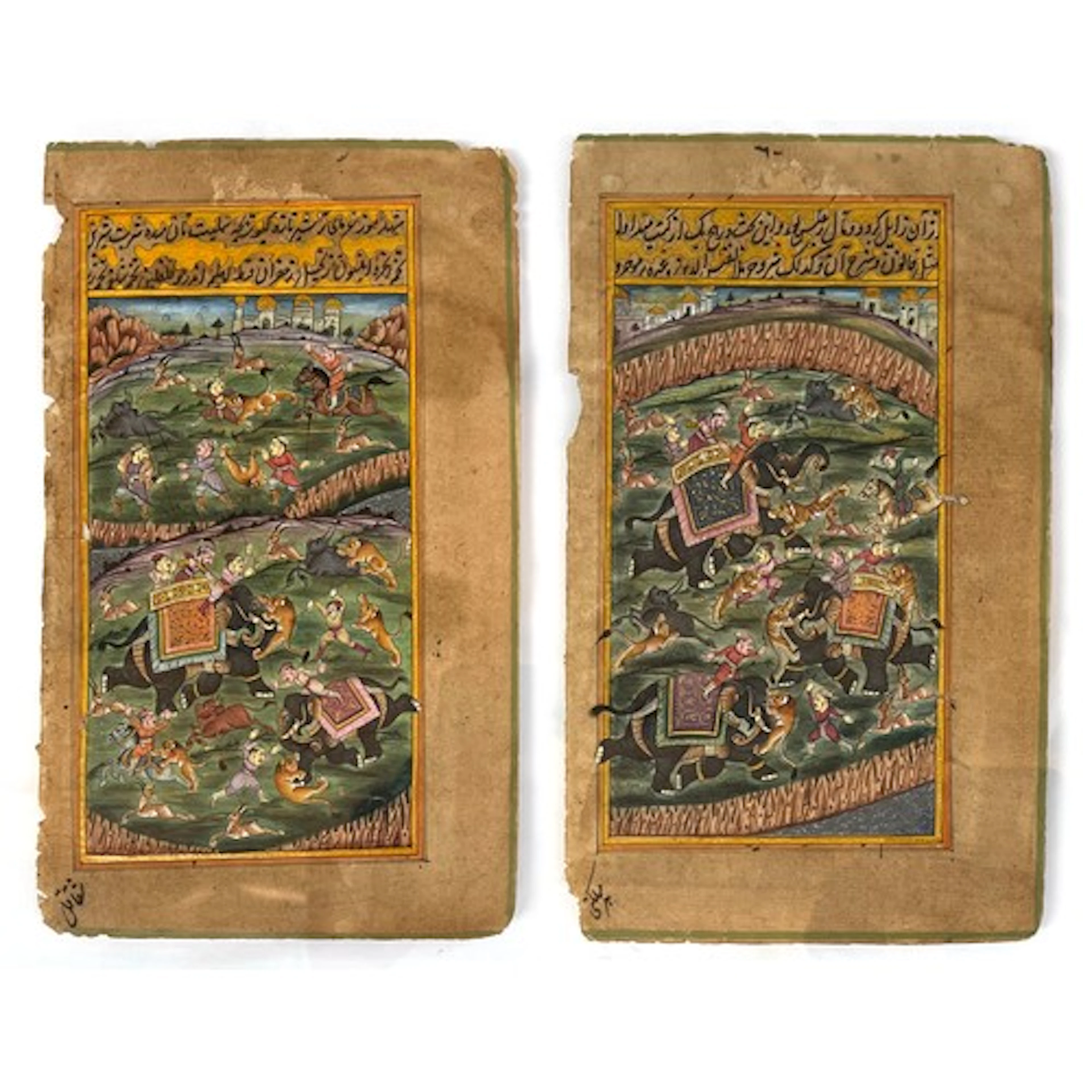 A pair of 18th century Mughal gouache and gilt tiger hunting...
