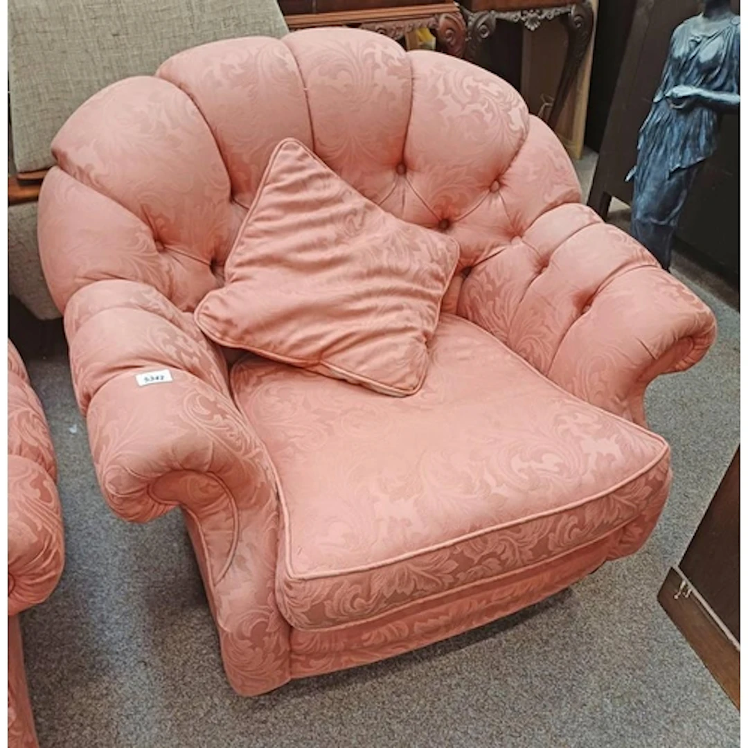 OVERSTUFFED ARMCHAIR WITH PINK FOLIAGE PATTERN LABELLED LINC...
