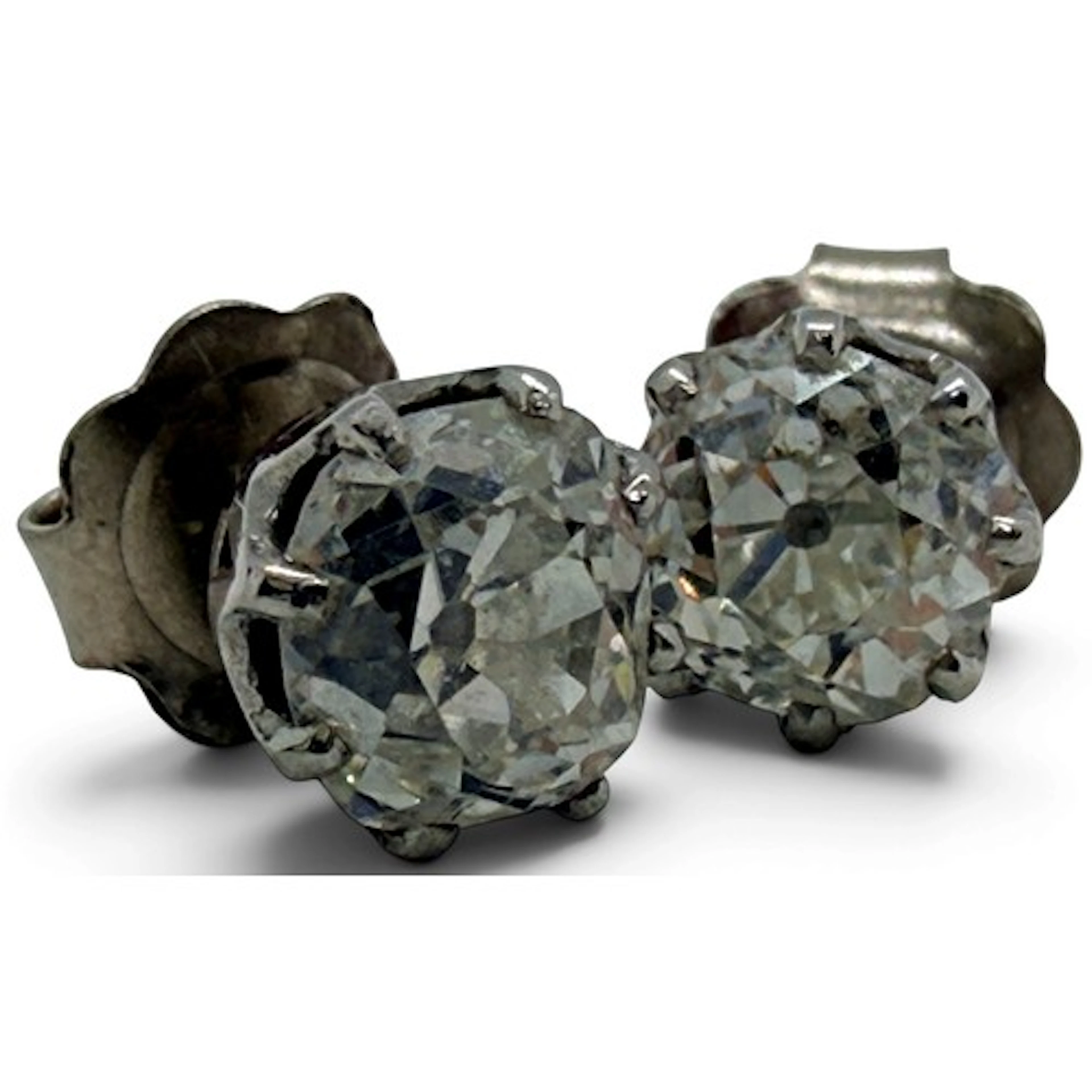 A pair of diamond stud earrings, each set with an old-cut di...