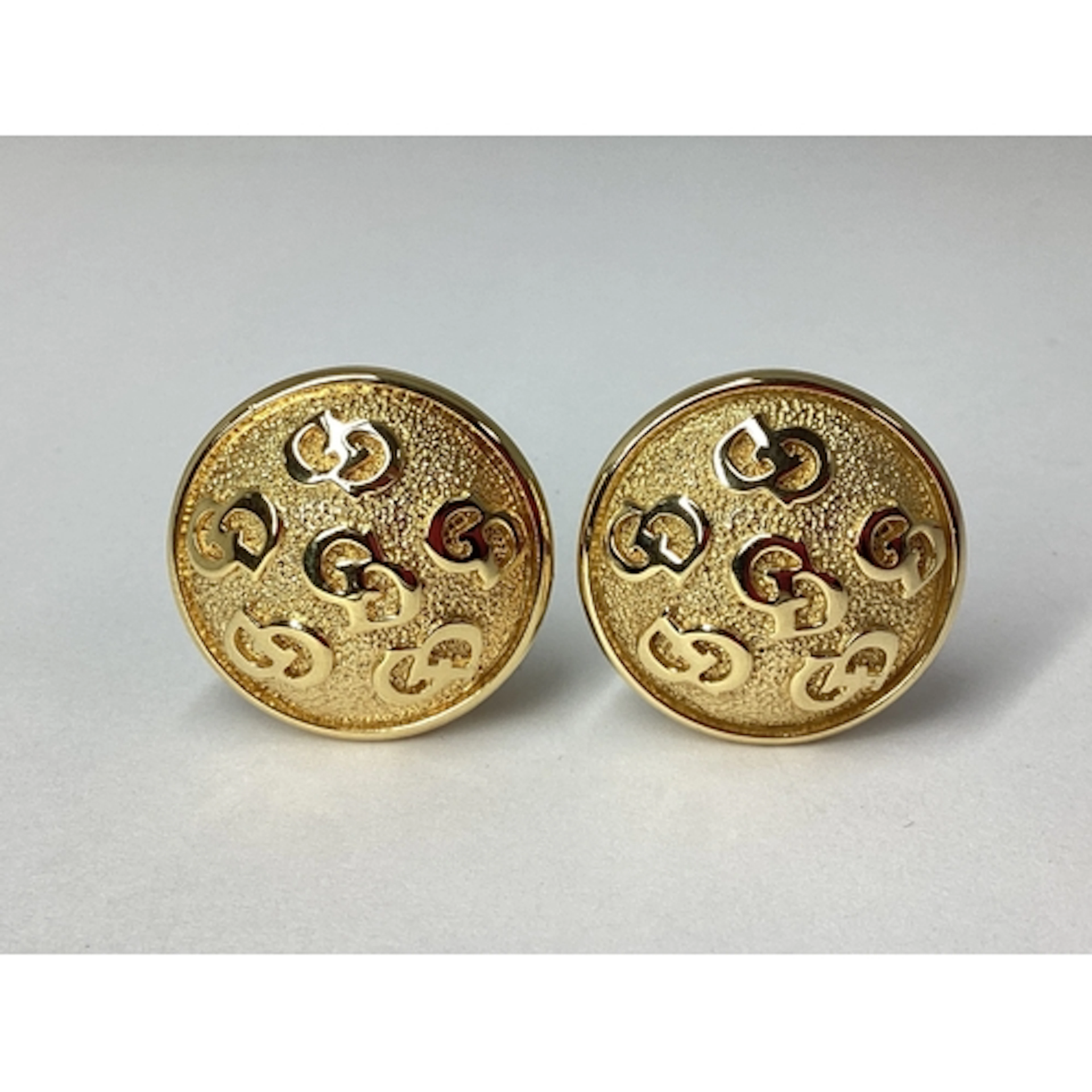 Christian Dior; A Pair of Gilt Metal Circular Clip On Earrin...