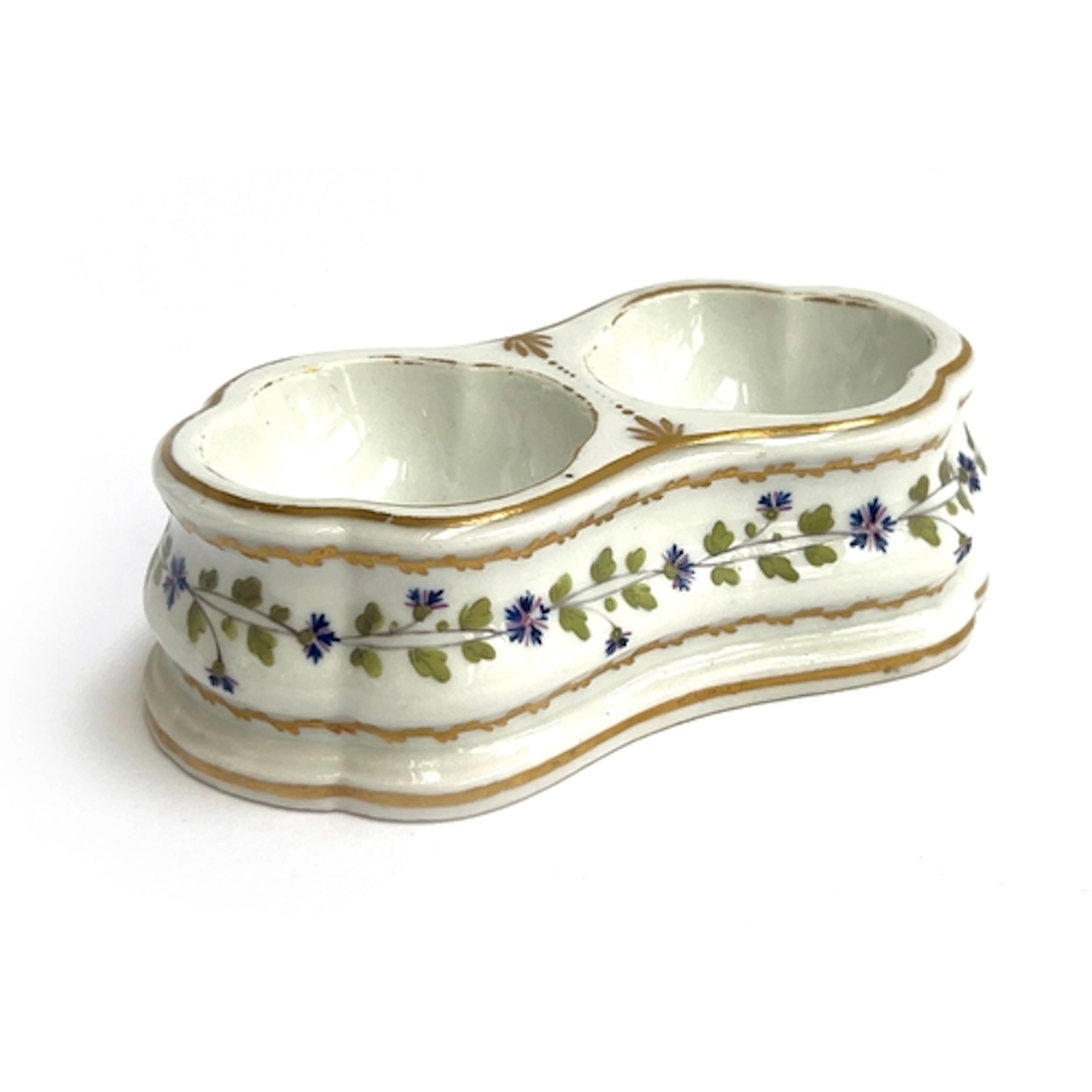A 19th century handpainted porcelain double salt with flora...