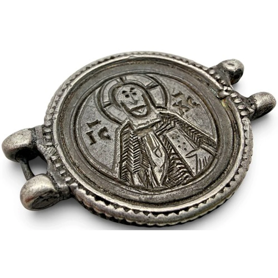 A Middle Byzantine devotional silver bifacial chain closure ...