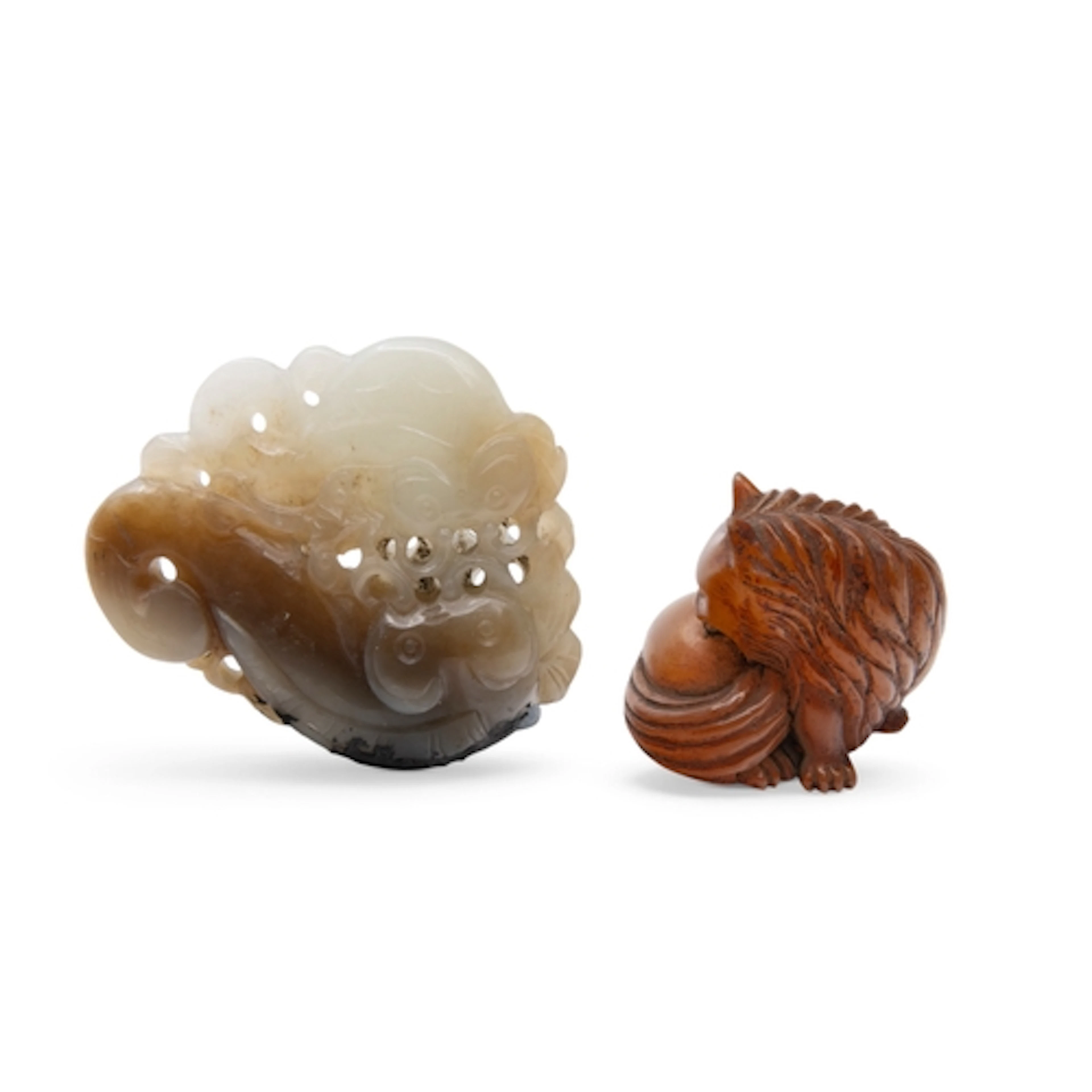 A CHINESE CARVED JADE 'DOUBLE-CARP' PENDANT 19TH / 20TH CENT...