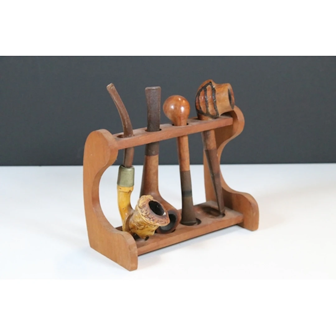 Wooden pipe stand containing four pipes including burr walnu...