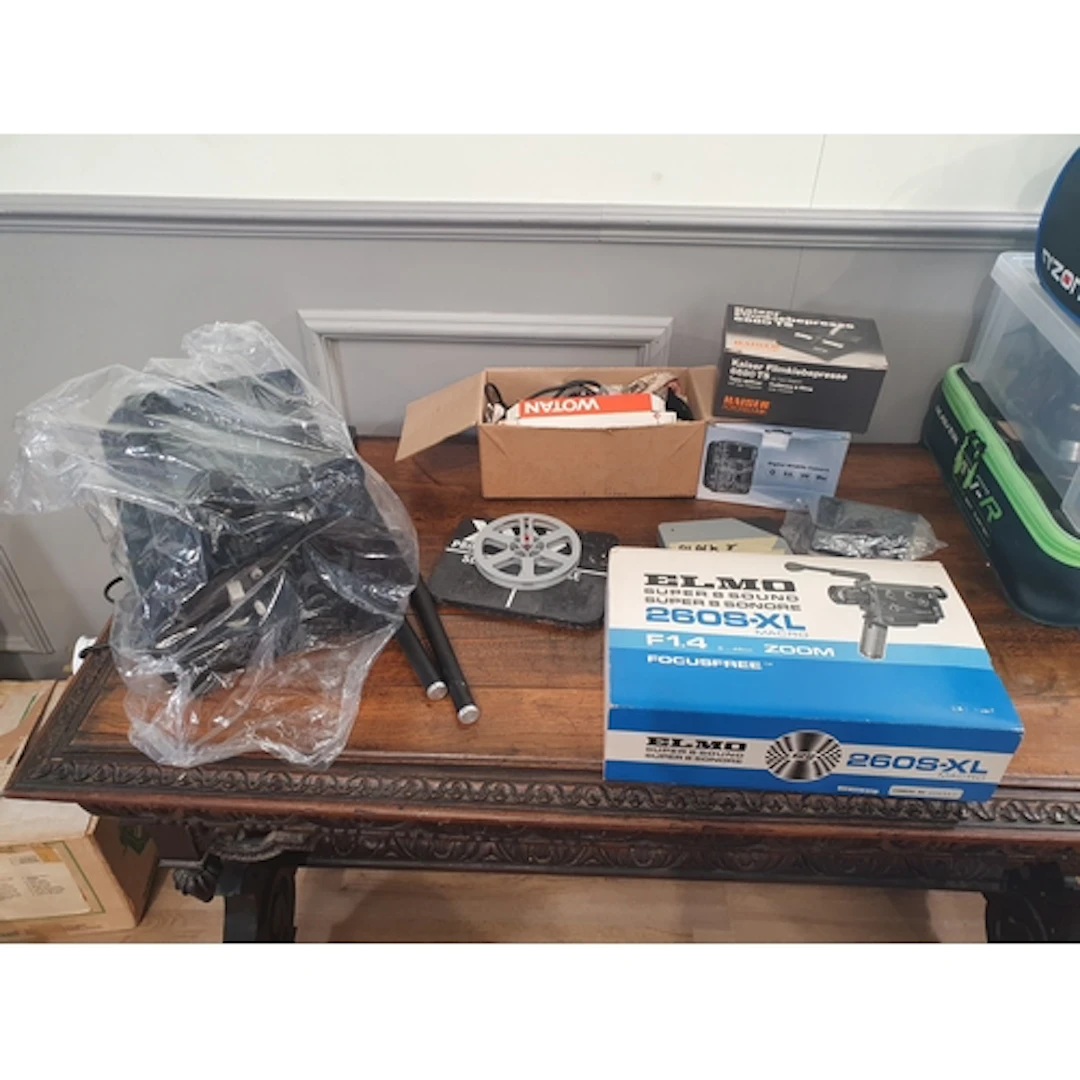 A box containing a quantity of Camera equipment, (R1).