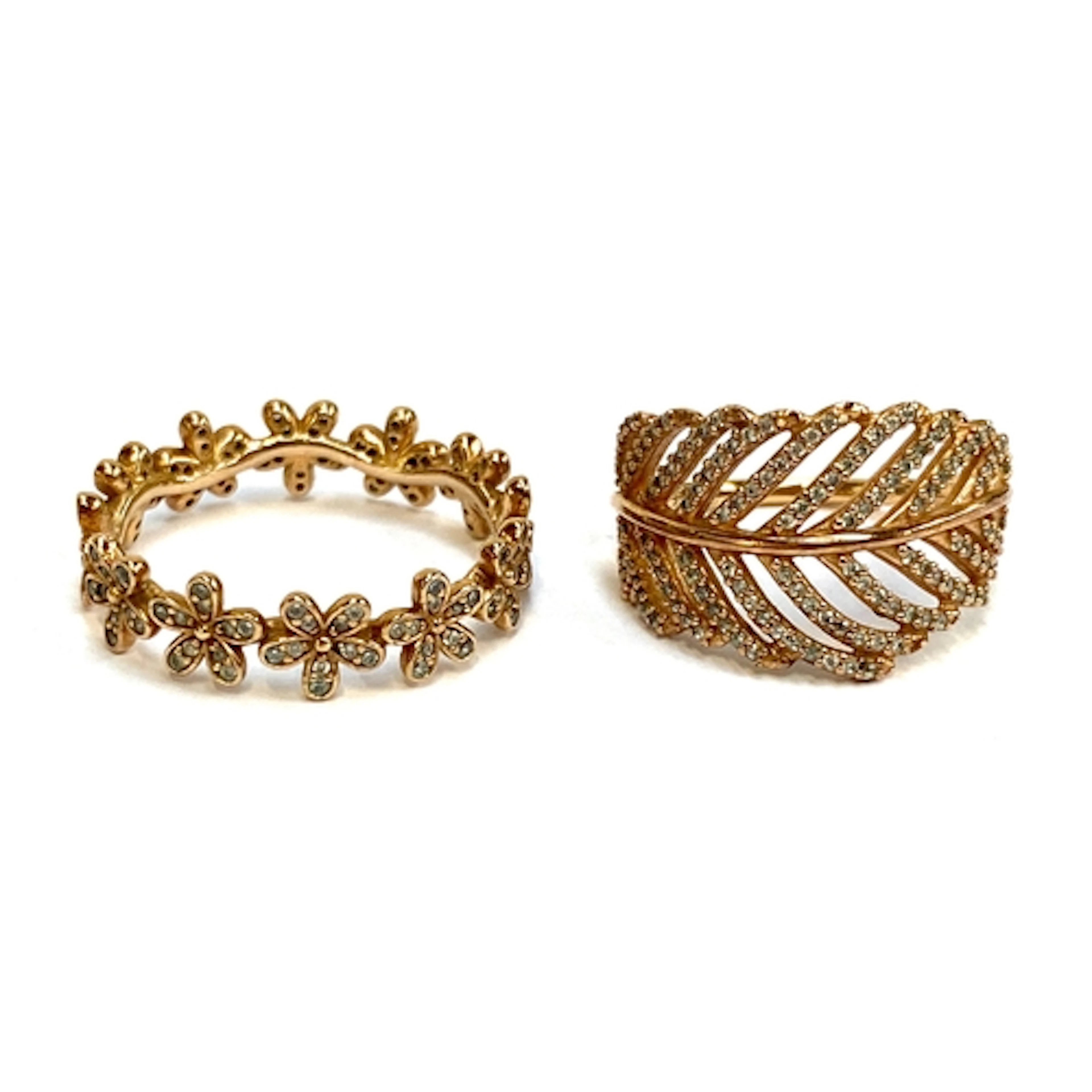 A Pandora rose gold plated daisy chain ring and Feather ring...