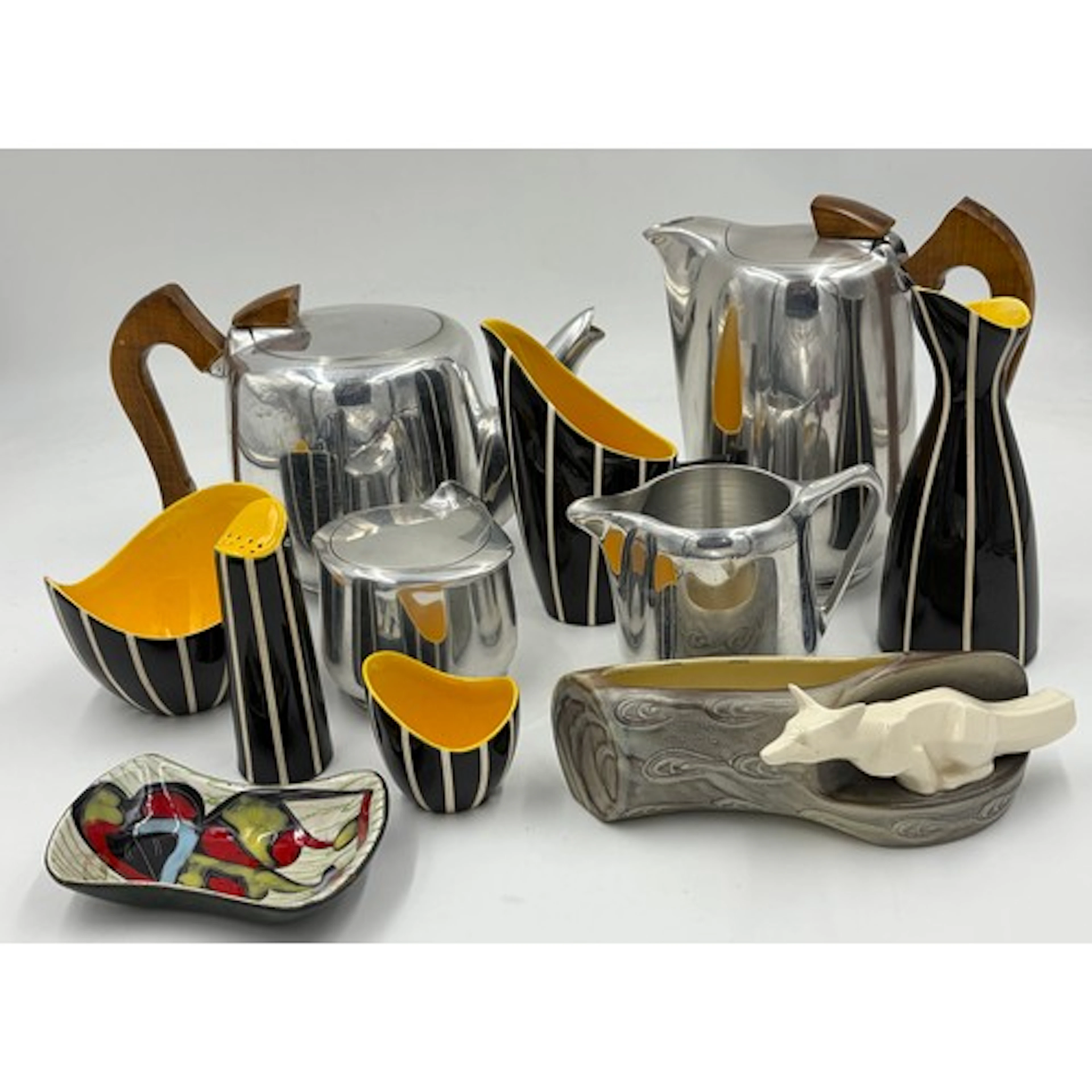 A collection of Newmaid coffee pot, tea pot, sugar pot and m...