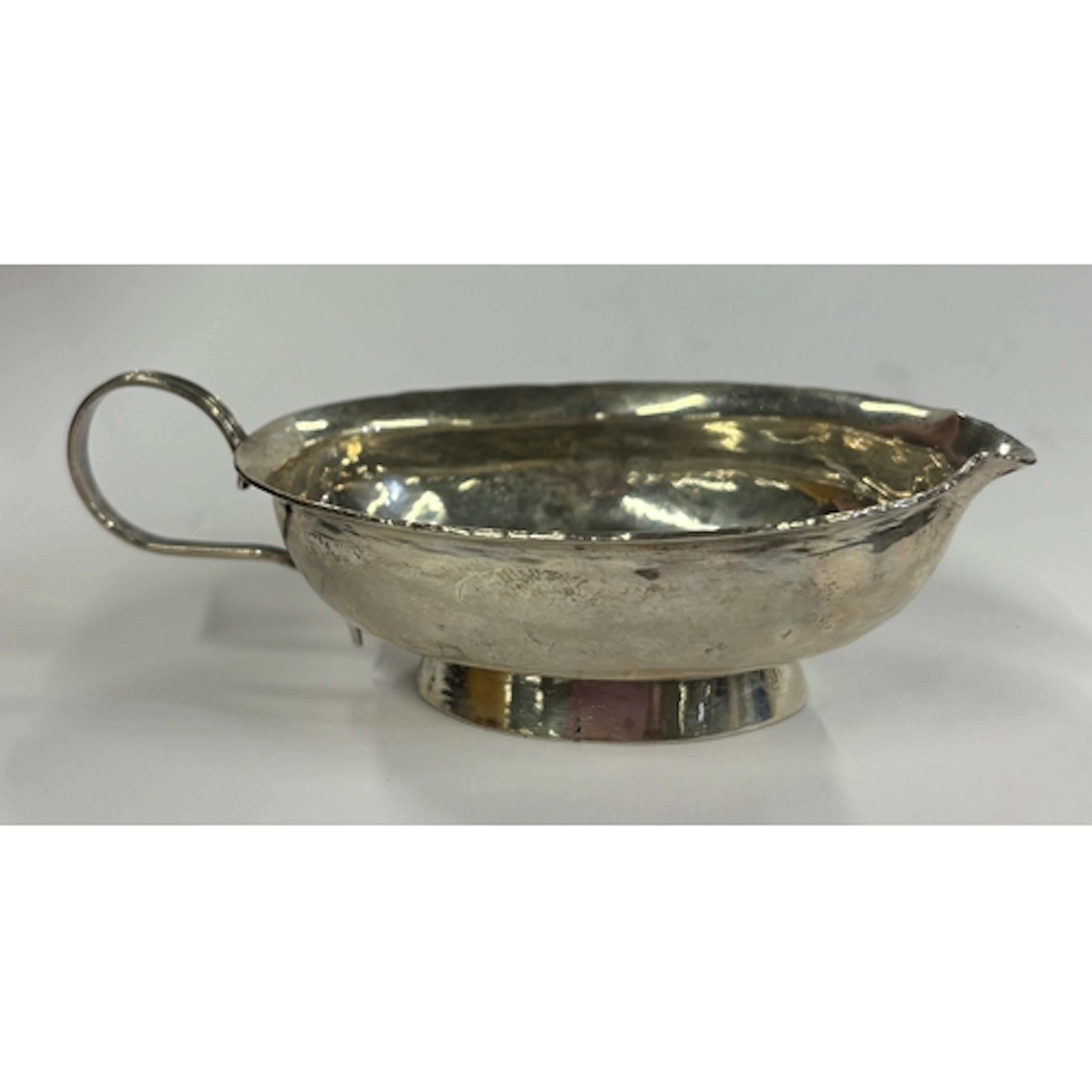 A small Georgian silver pap boat with coin decoration. Appro...