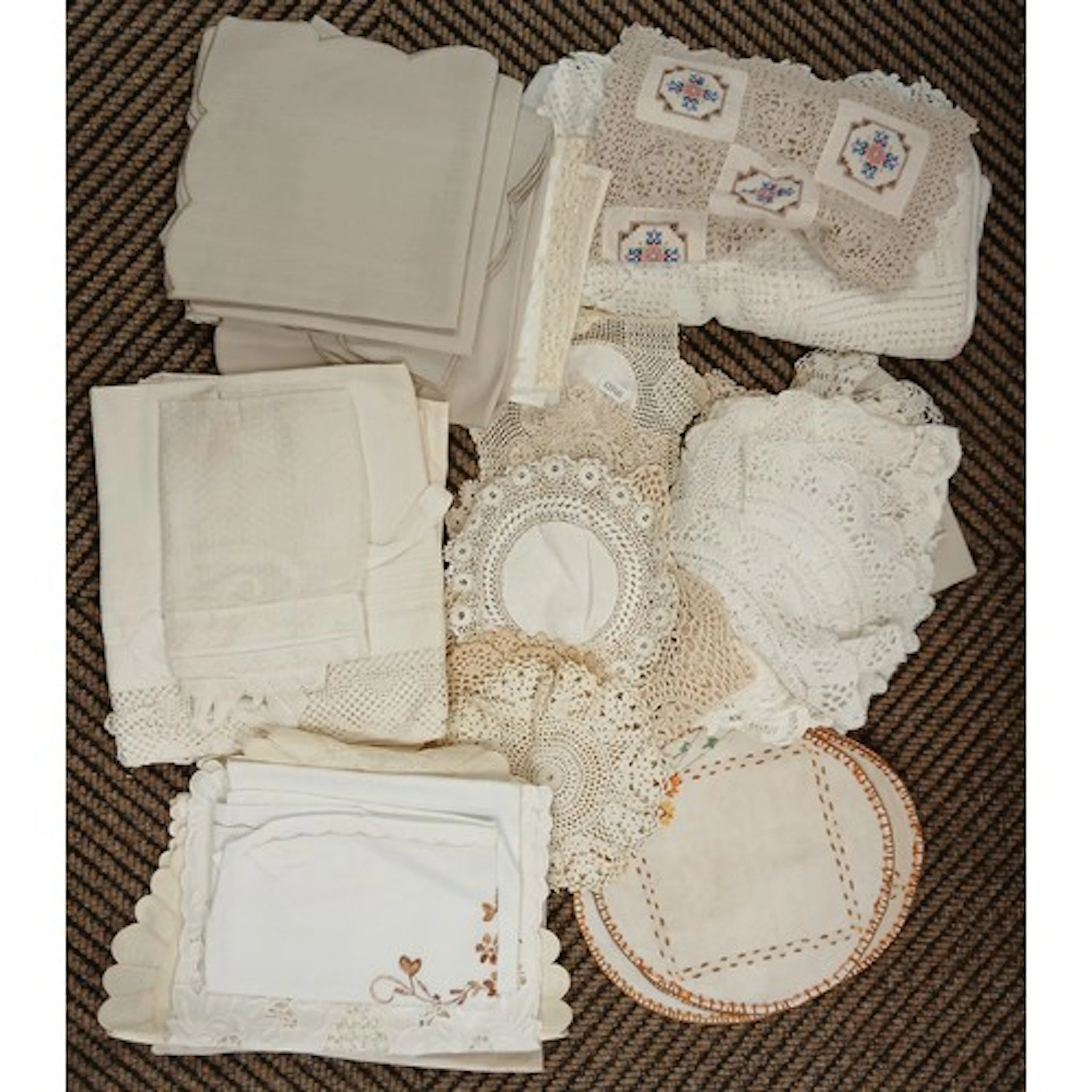 Collection of lace and lace edged table linens.