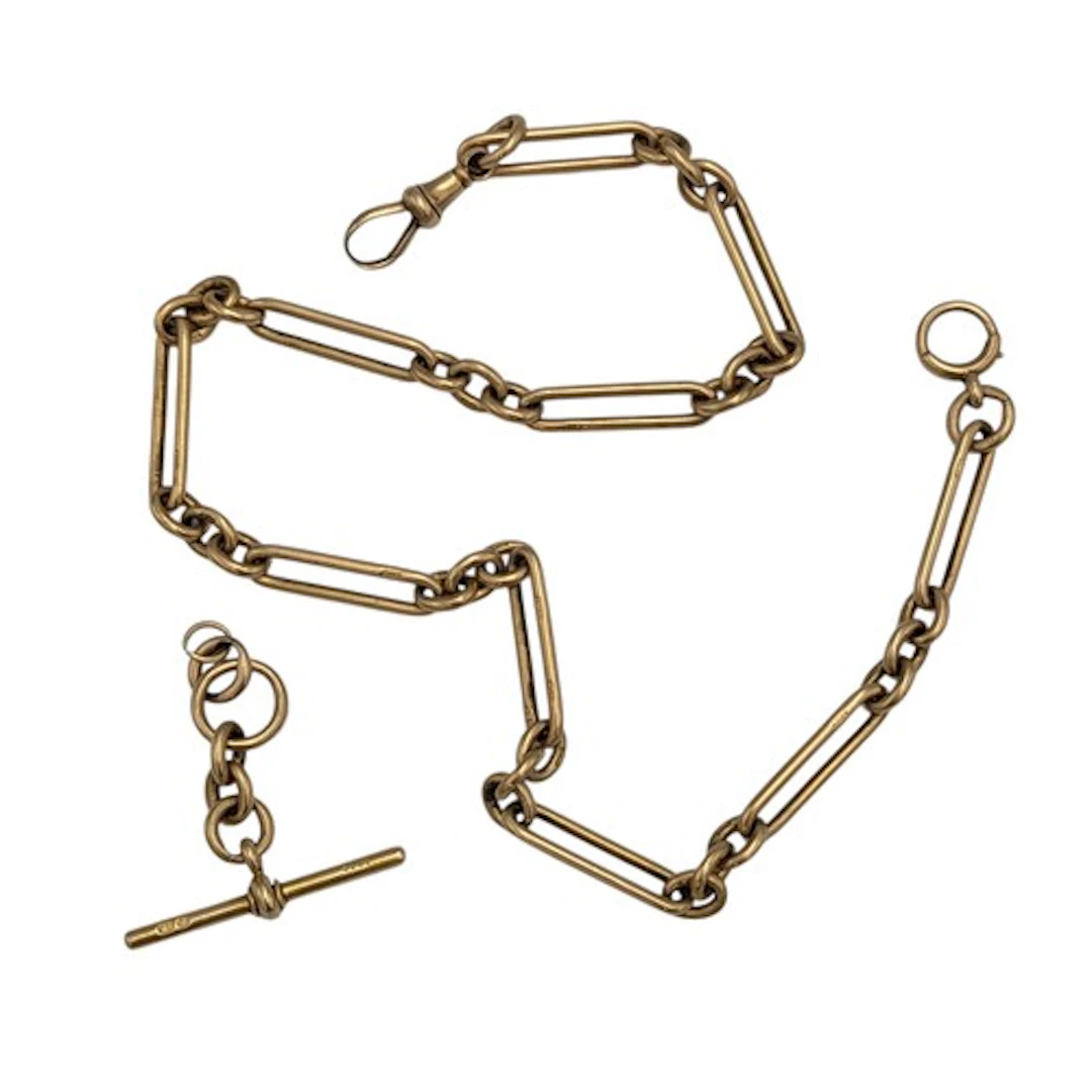 A Victorian 18ct gold watch chain, 39cm long; associated 18c...