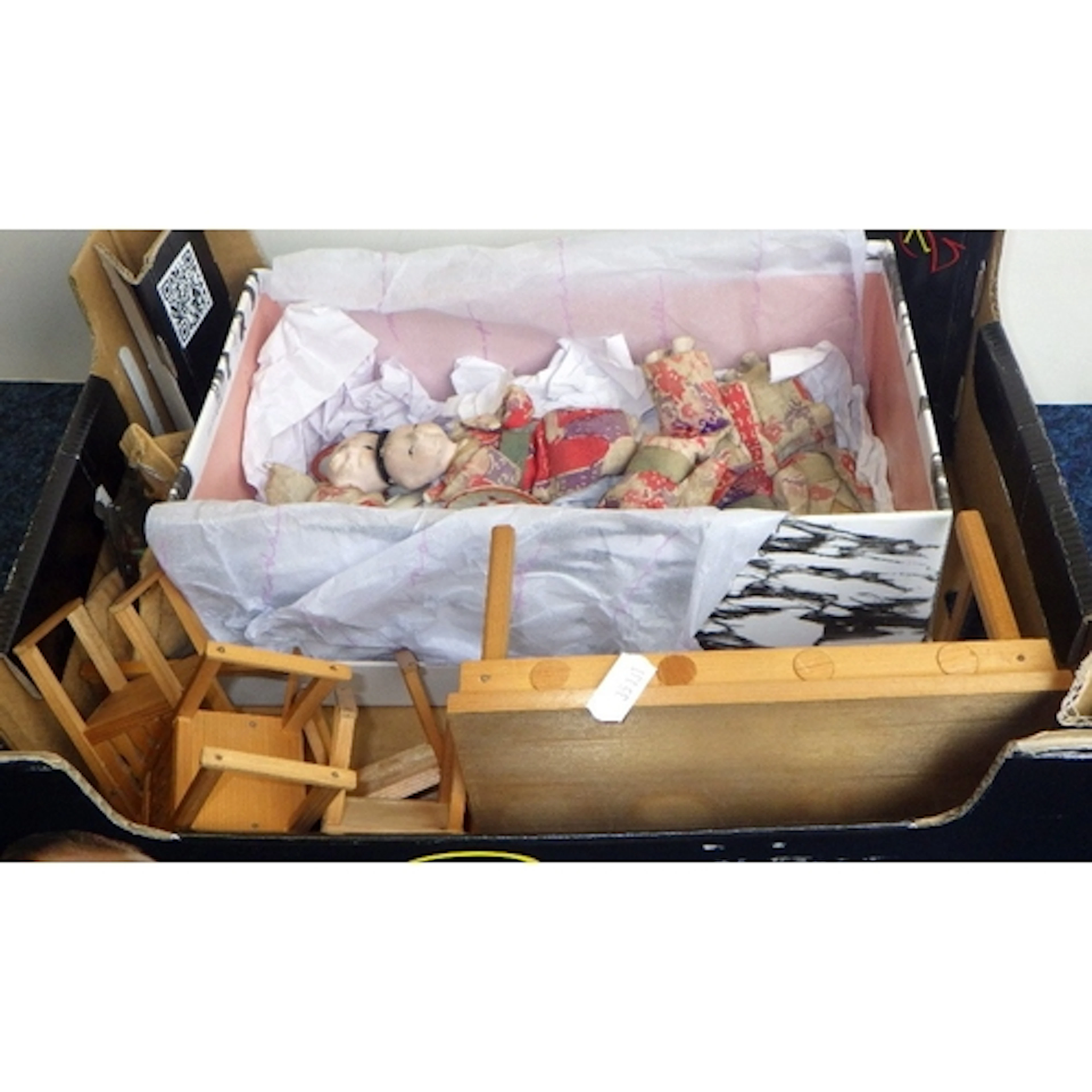 A group of Oriental dolls, dolls' furniture etc