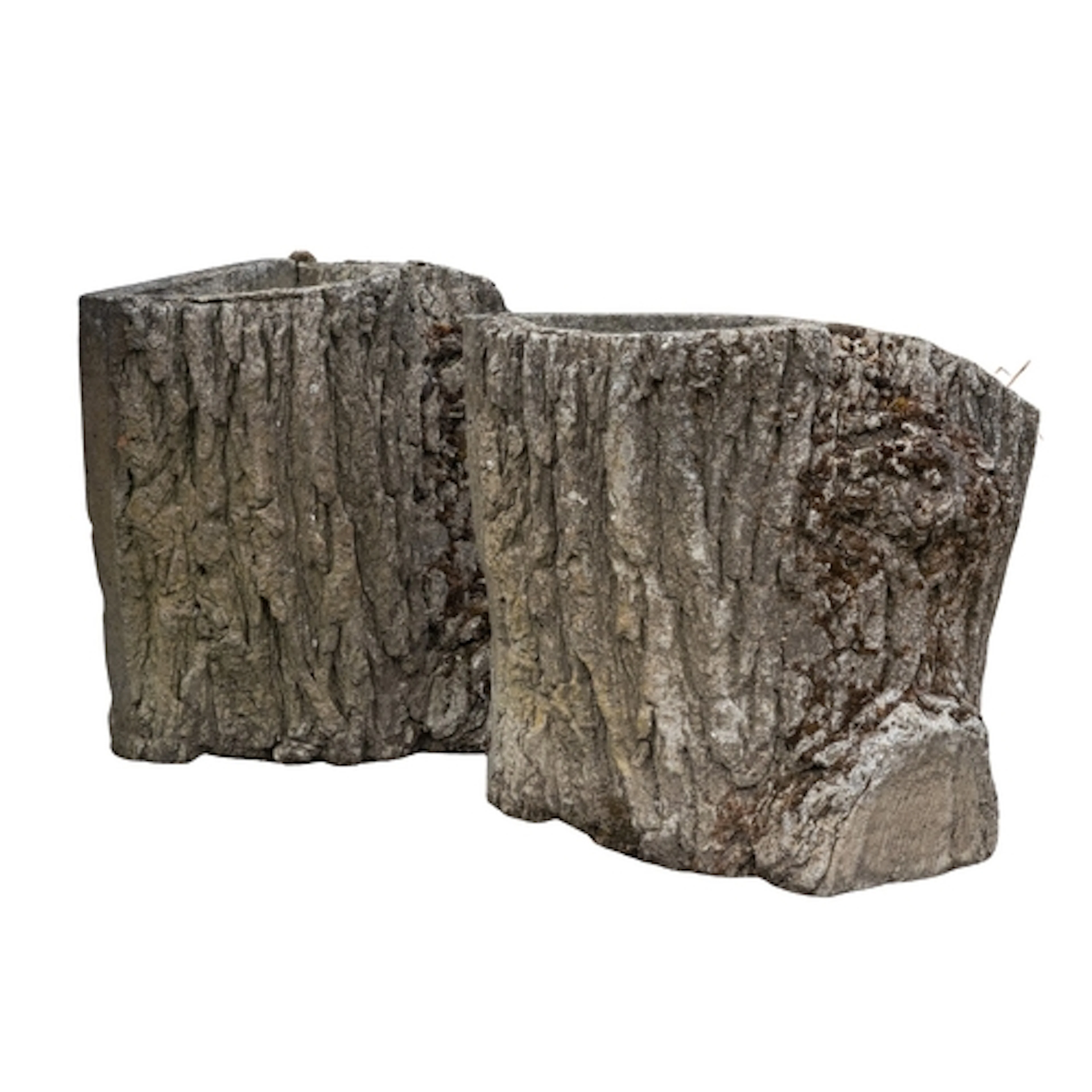 A pair of stone composition garden planters modelled as tree...