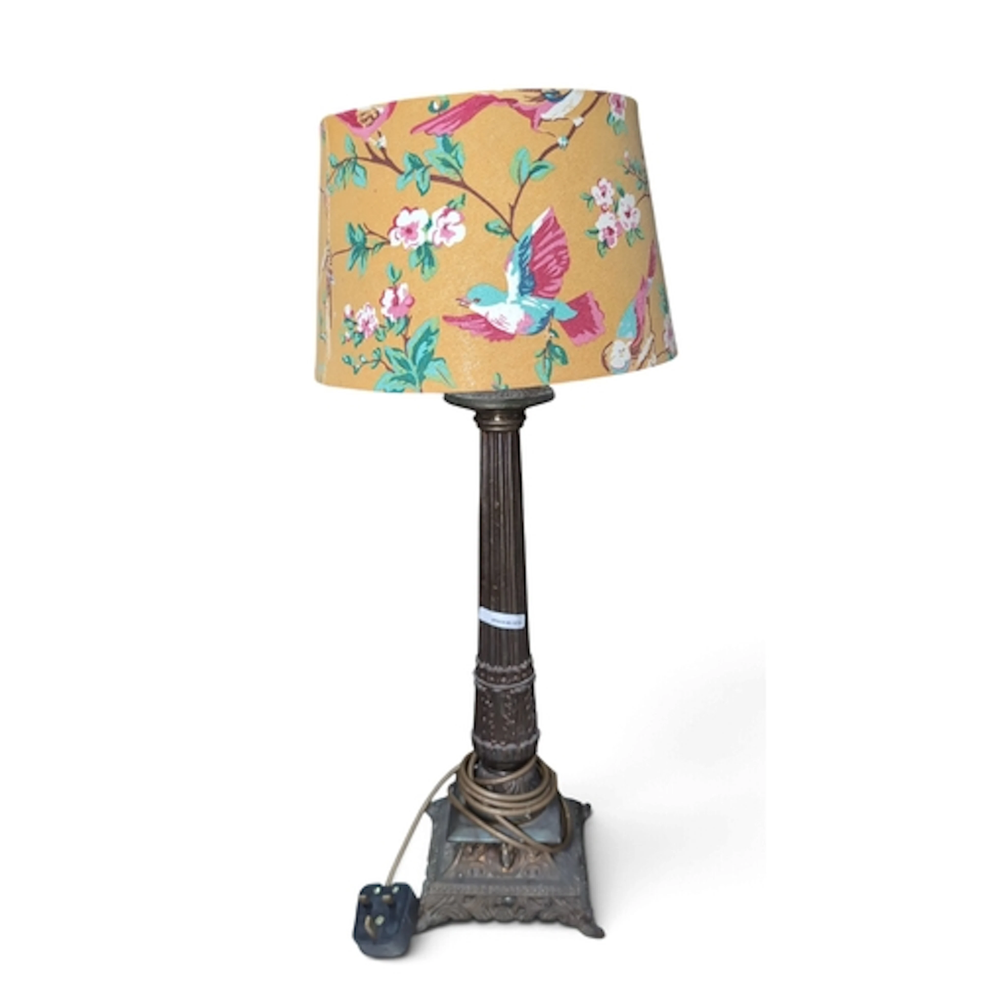 Neoclassical-style cast-metal table lamp, its fluted column ...