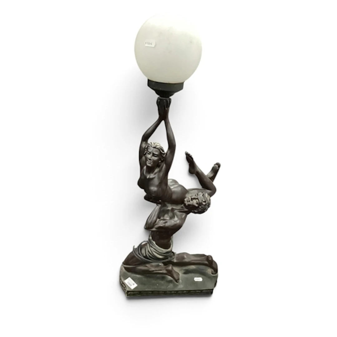 Ackerman Art Deco-Style Figural Table Lamp, depicting a male...
