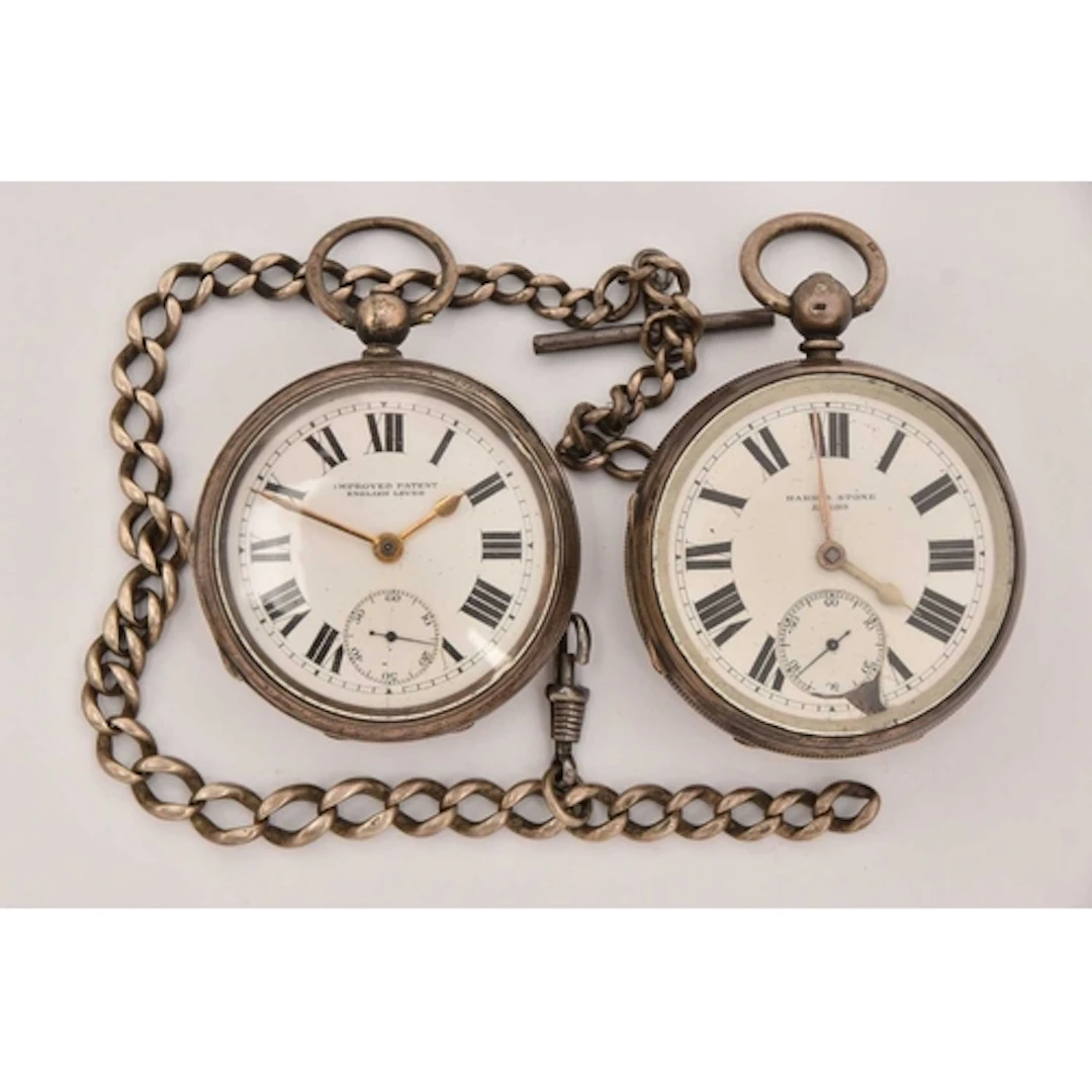 TWO SILVER OPEN FACE POCKET WATCHES AND AN ALBERT CHAIN, two...
