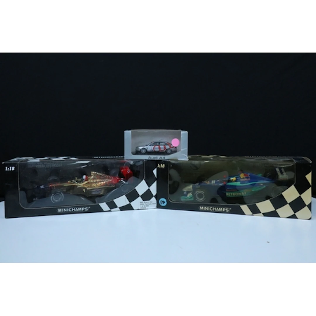 Three boxed Paul's Model Art Minichamps diecast models to in...