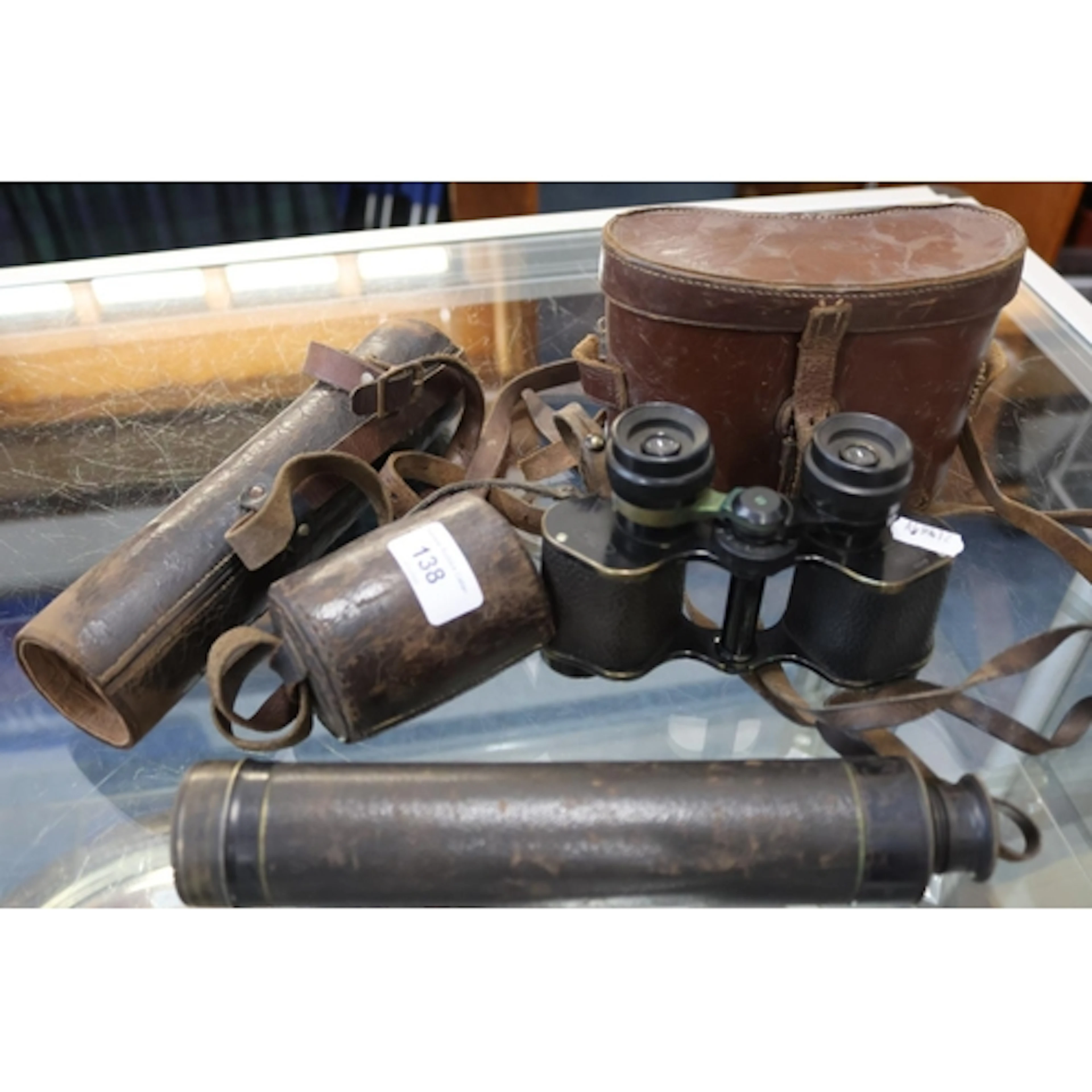 Four draw telescope, two pairs of binoculars.