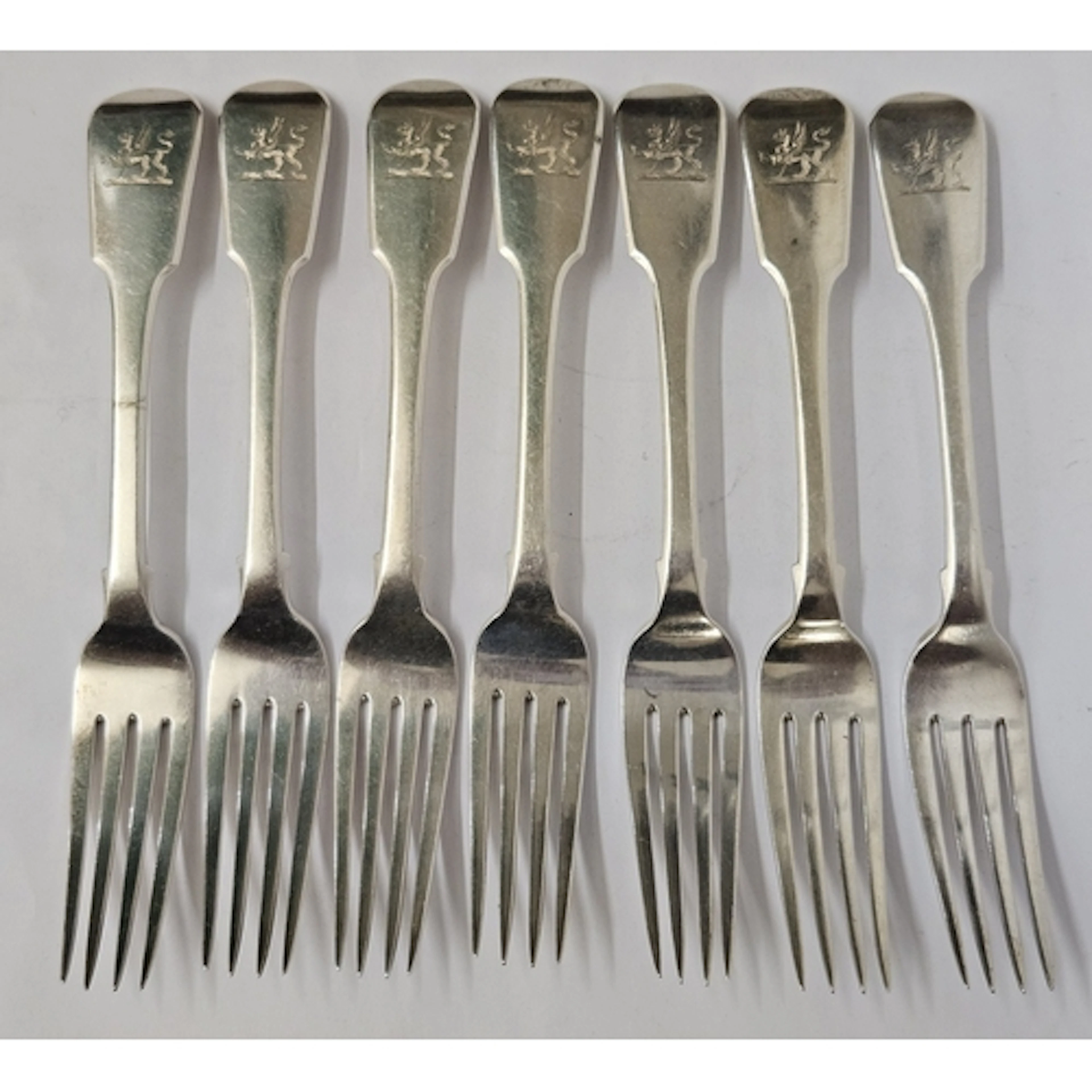 Set of 7 Hallmarked Silver Georgian Dinner Forks with Griffi...