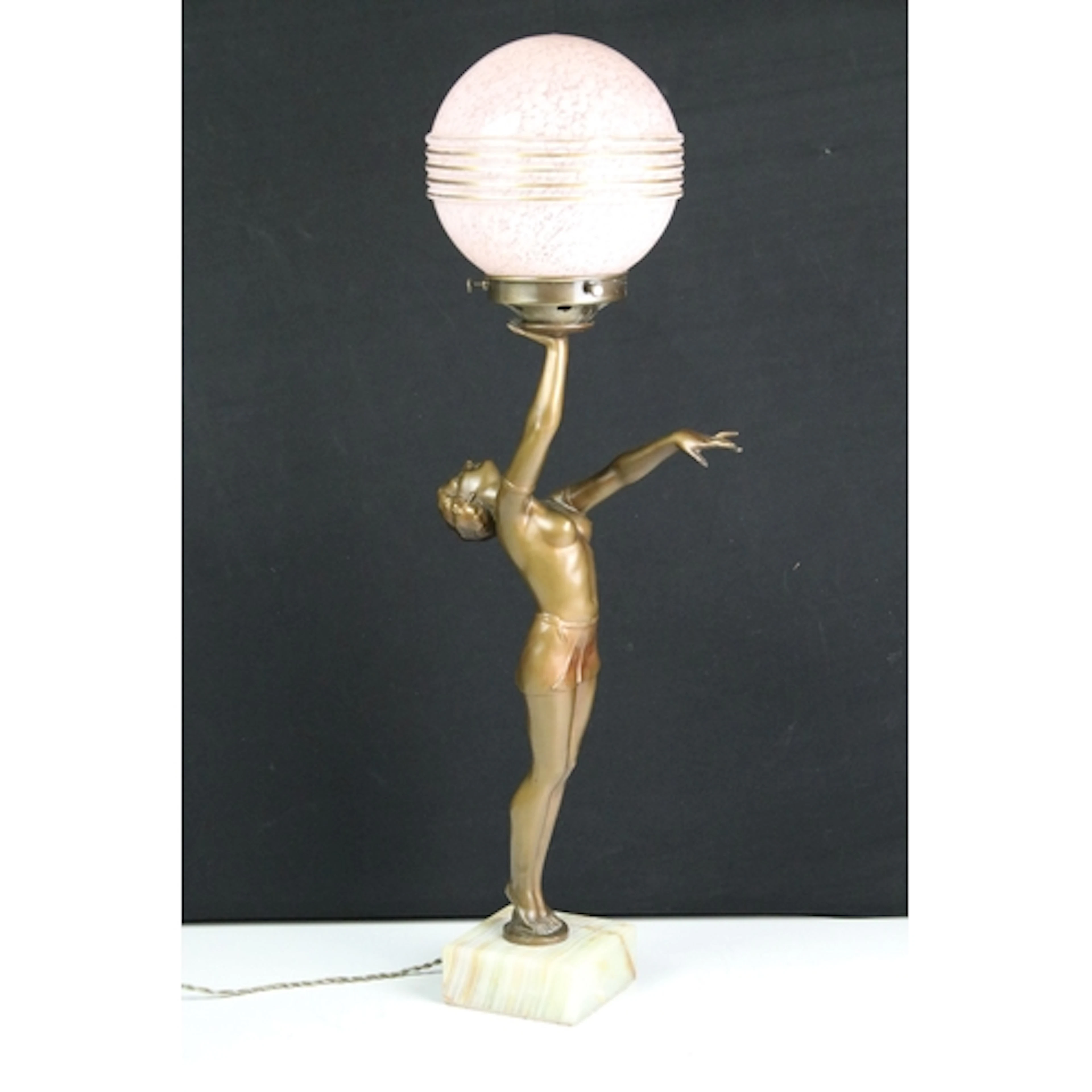 Art Deco figural lamp, bronzed metal figurine of a woman lif...