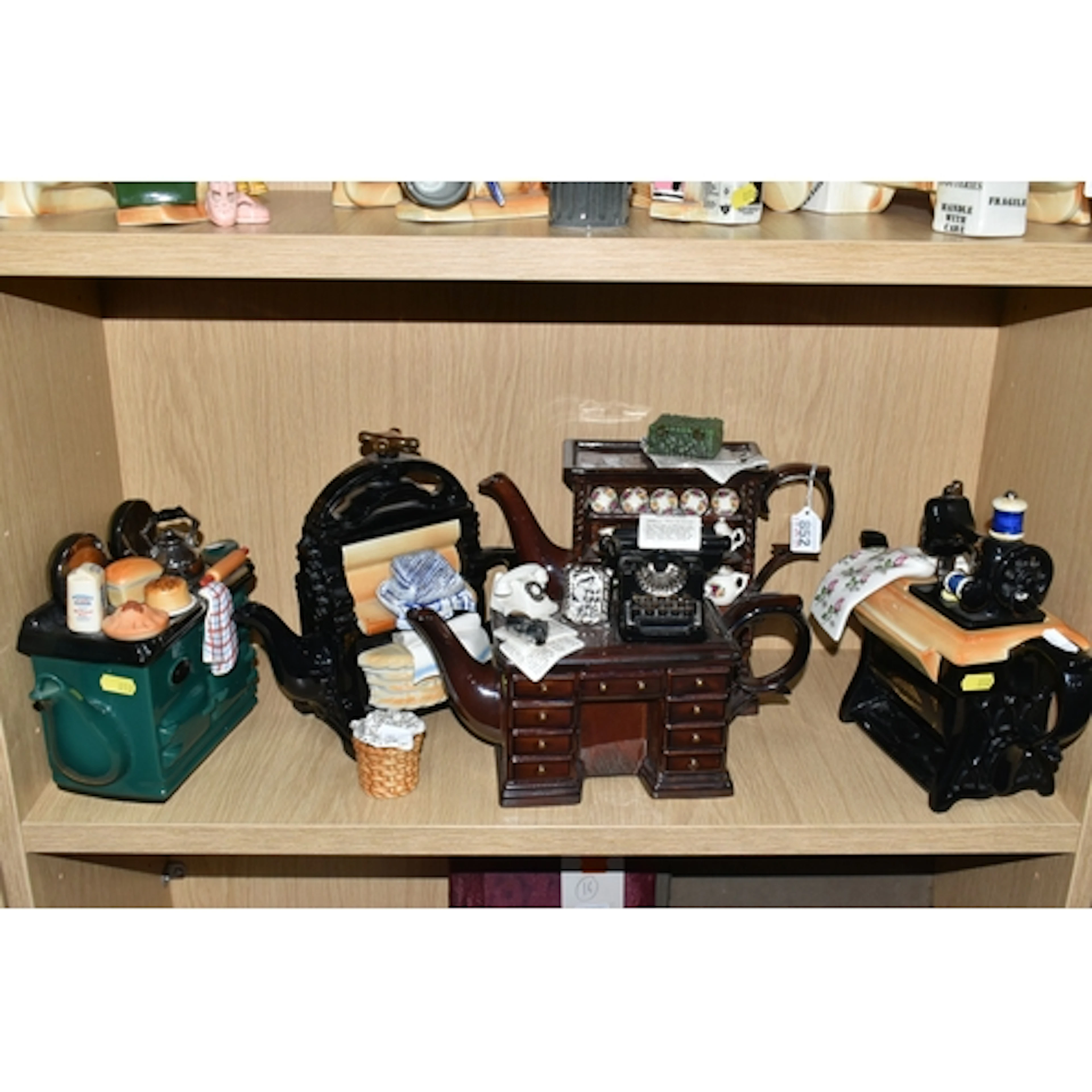 FIVE CARDEW DESIGN AND THE TEAPOTTERY NOVELTY TEAPOTS, compr...