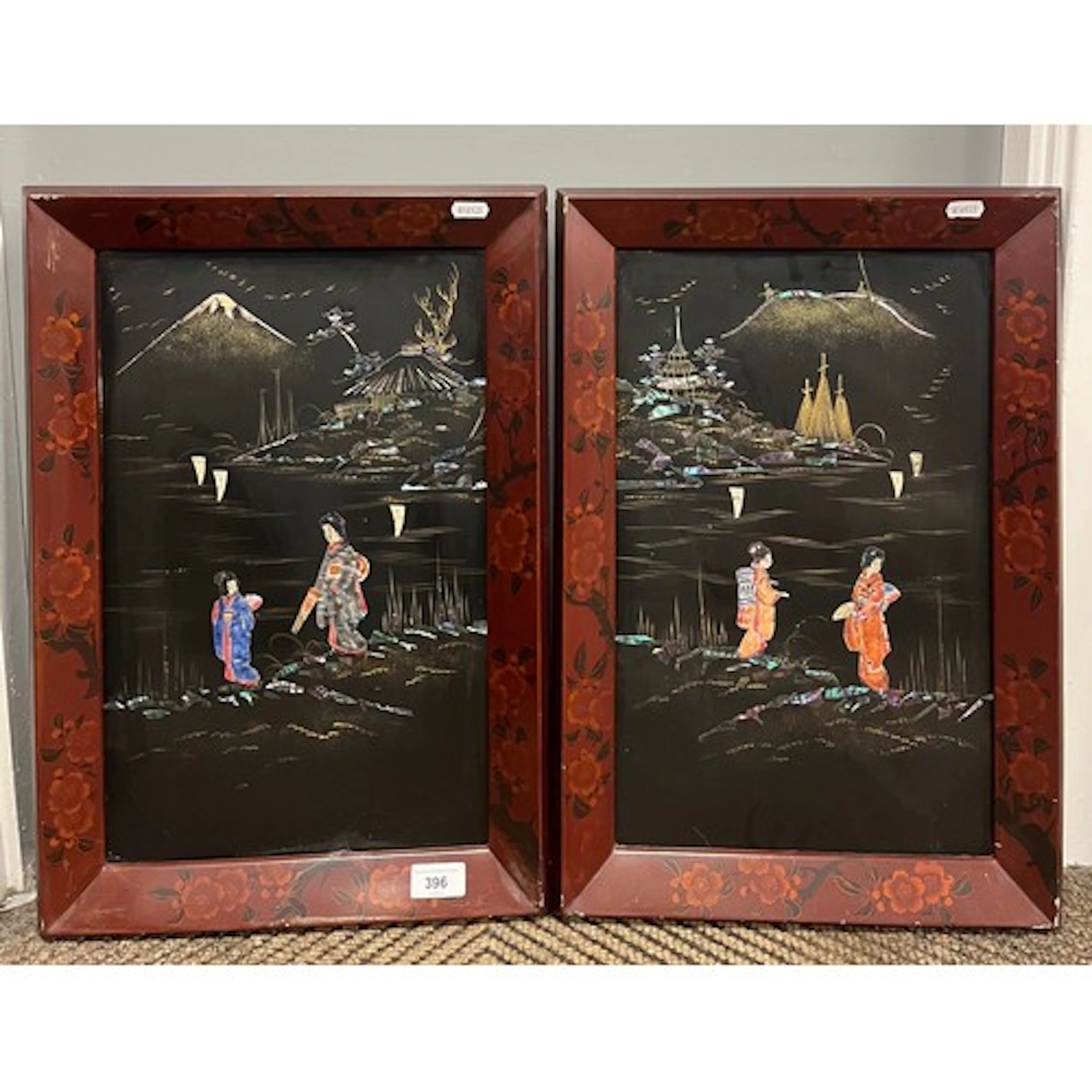 Pair of Oriental mother of pearl and lacquered pictures depi...