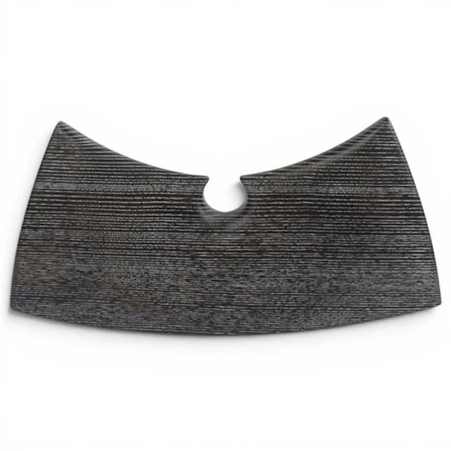 TED SUMMERHAYES, British, a black ash and lime carved wood s...