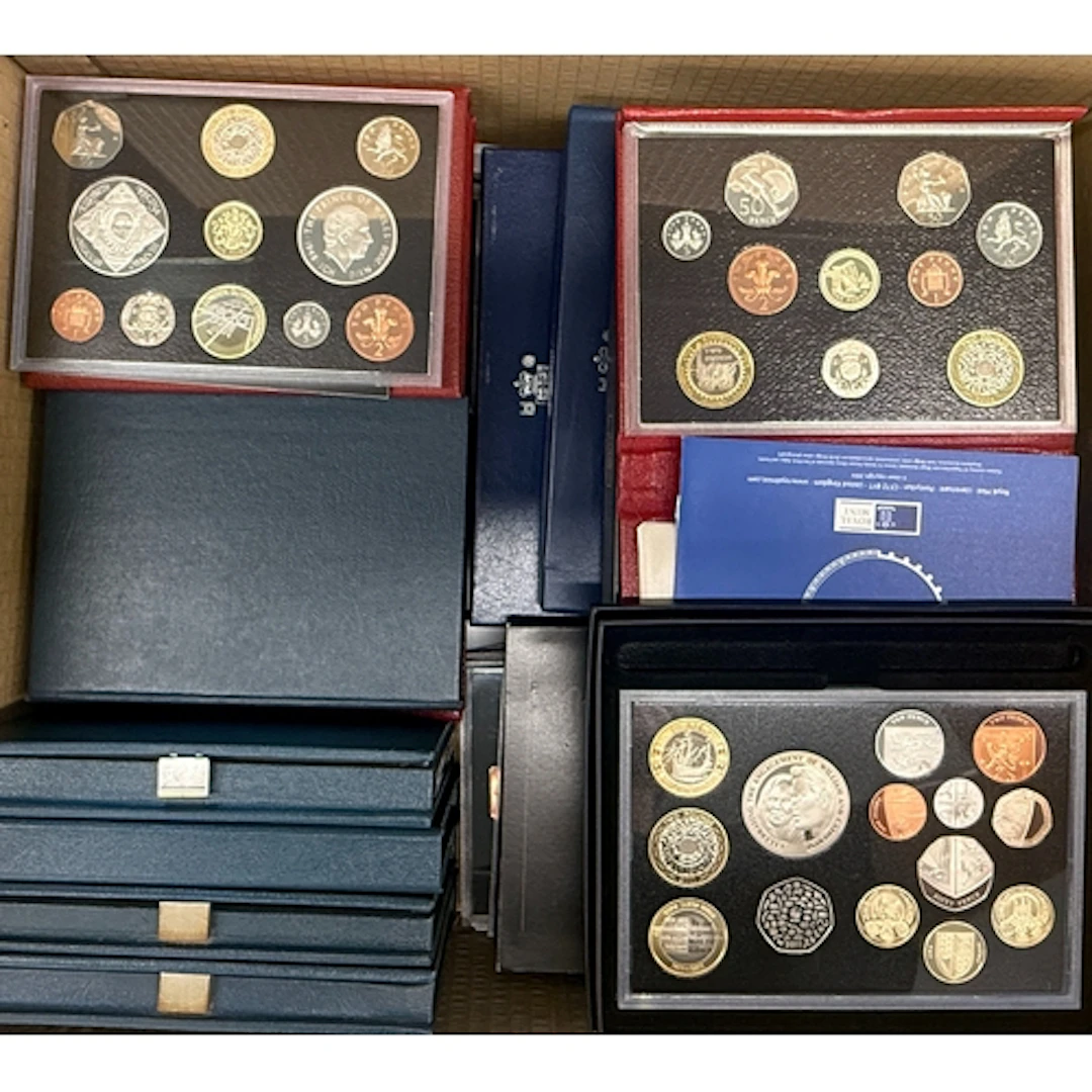 A collection of 22 UK QEII proof year sets, with duplication...
