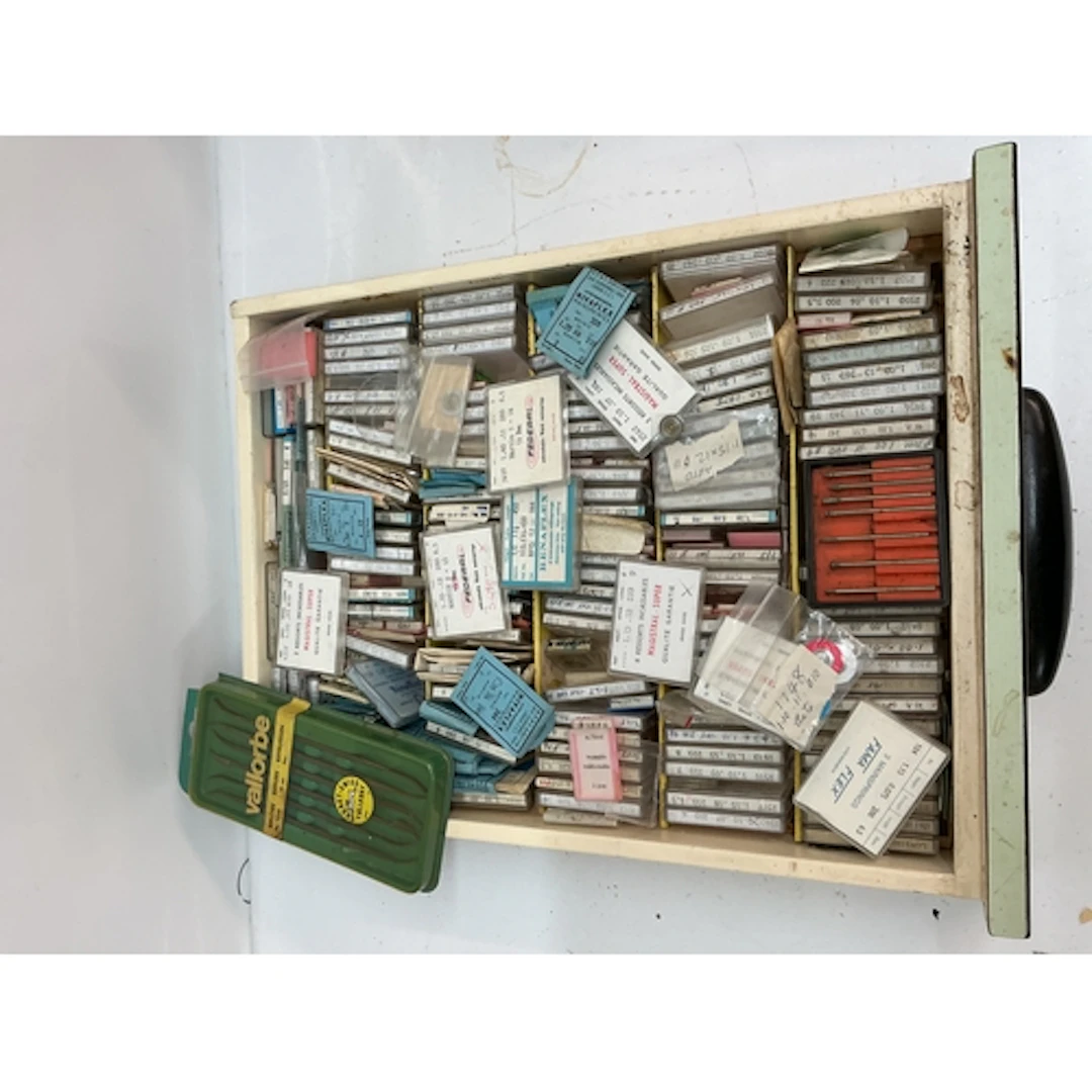 A tray containing boxed watch springs