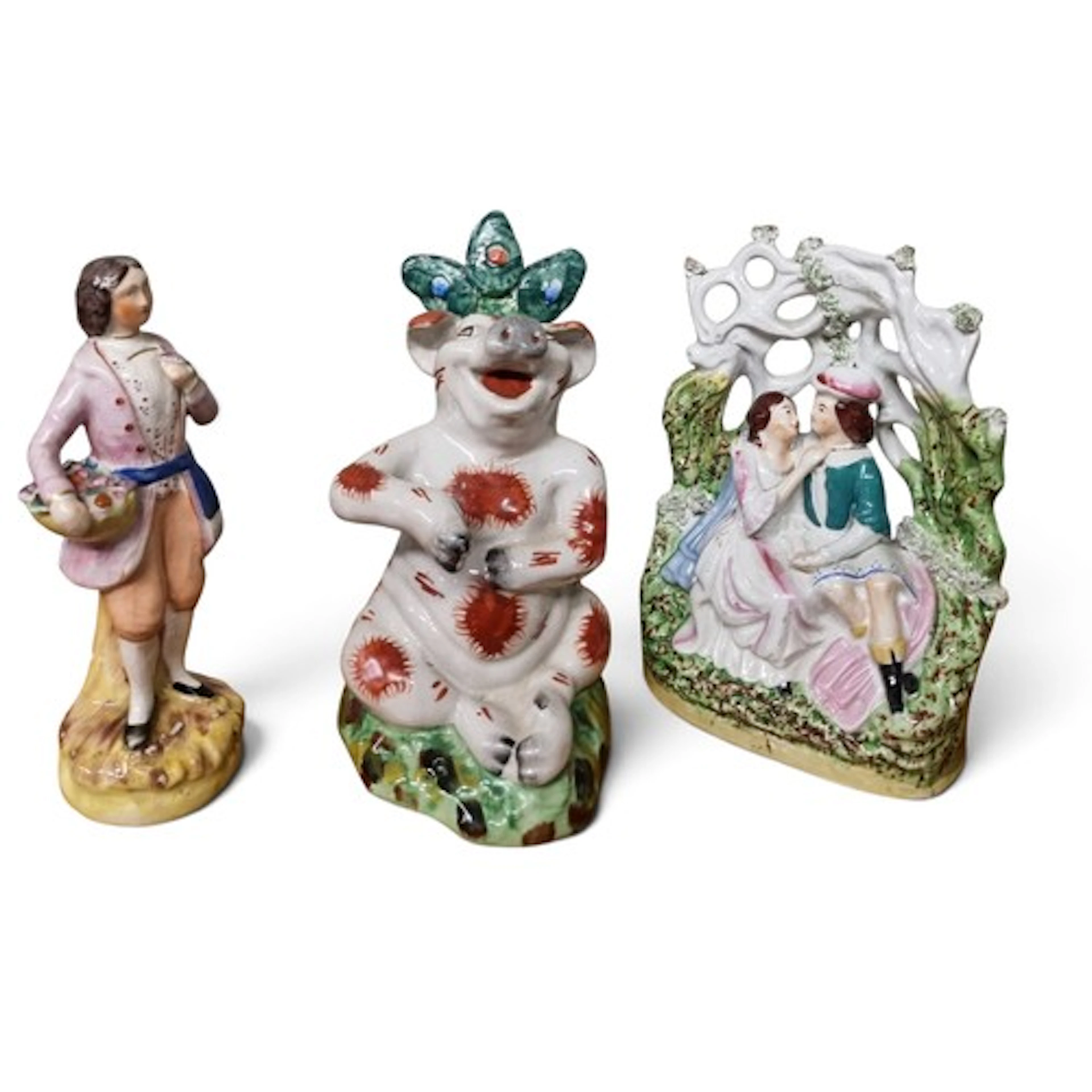 A 19th century Staffordshire hand-painted figure of a garden...