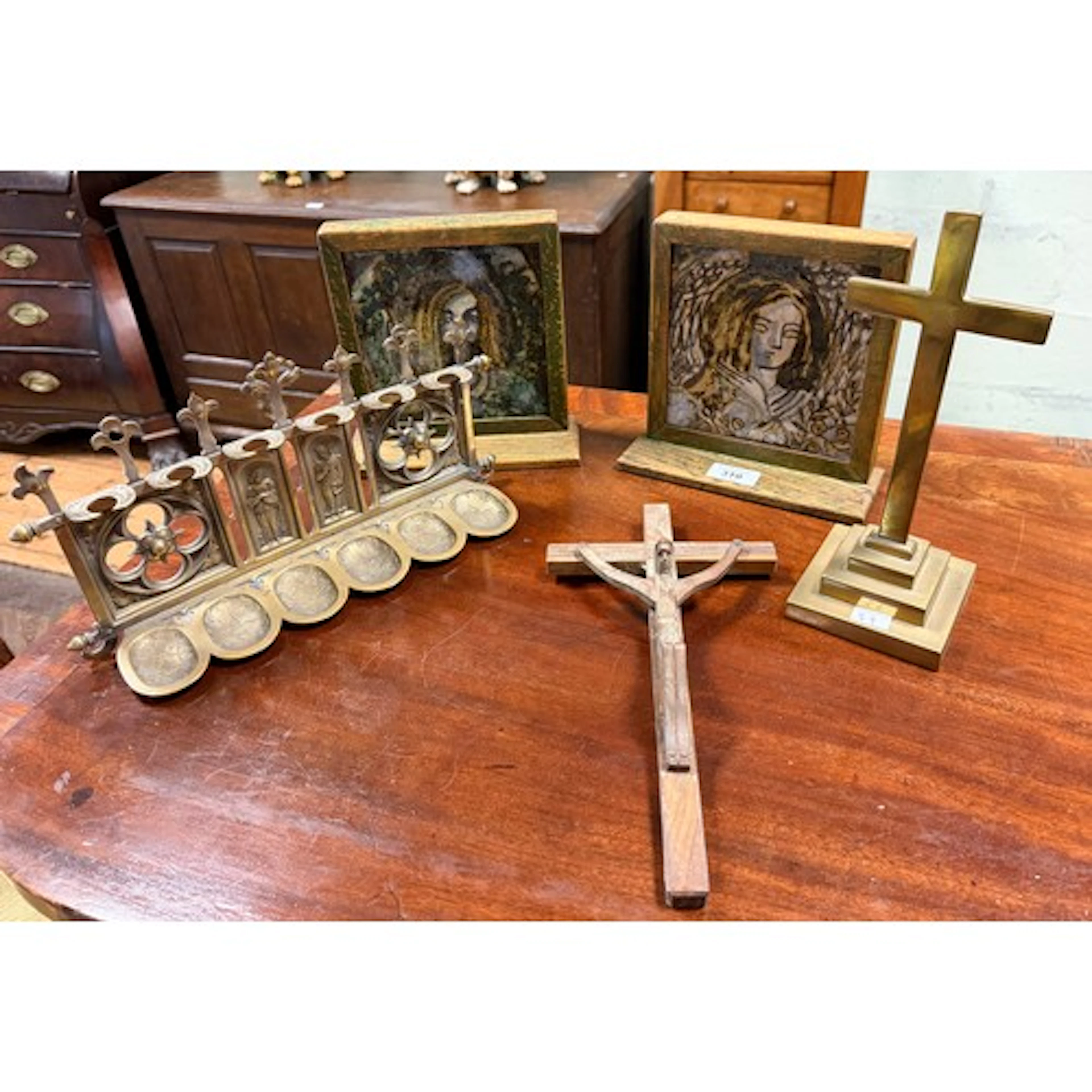 A collection of religious items to include a pair of oak fra...