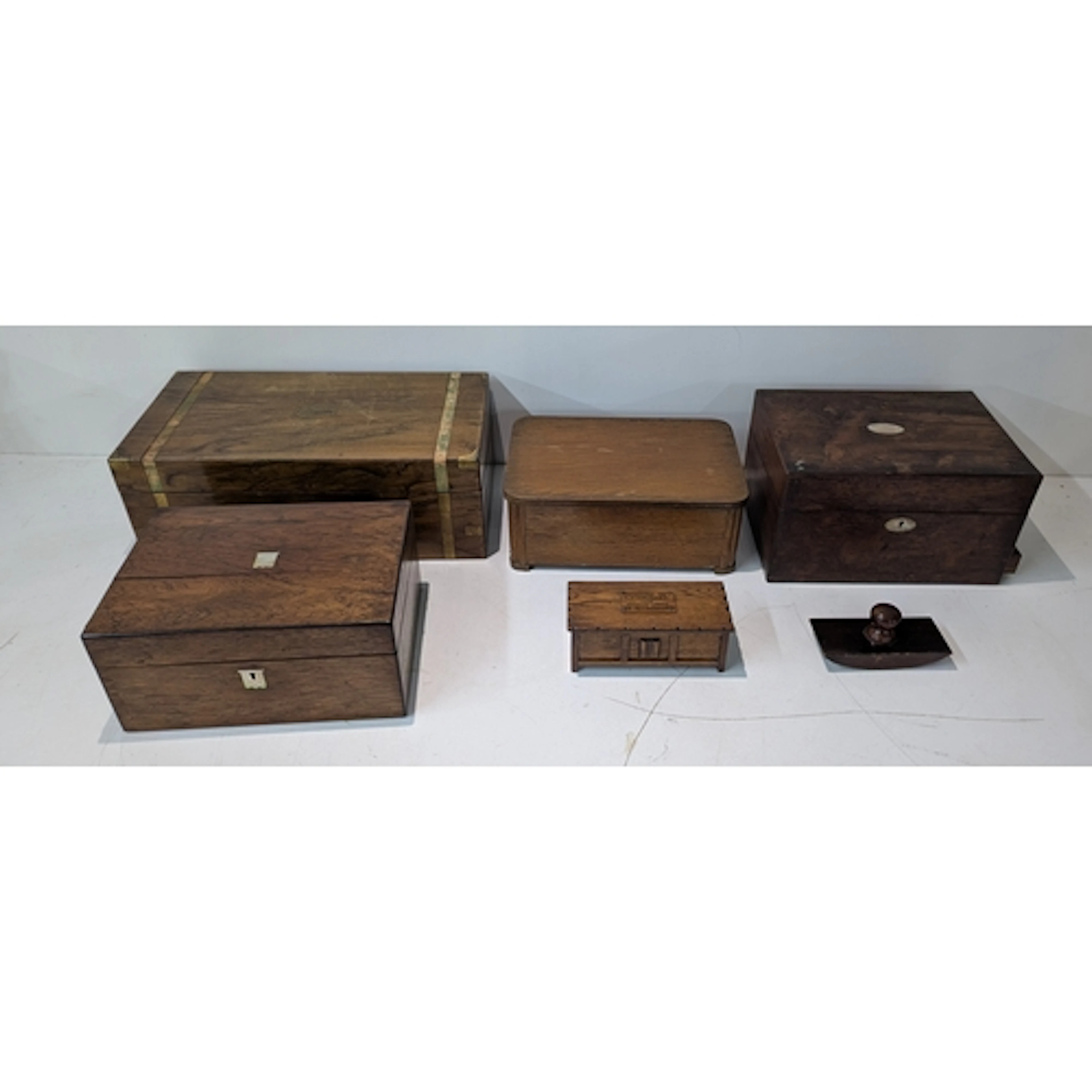 A small collection of wooden boxes to include a musical box ...