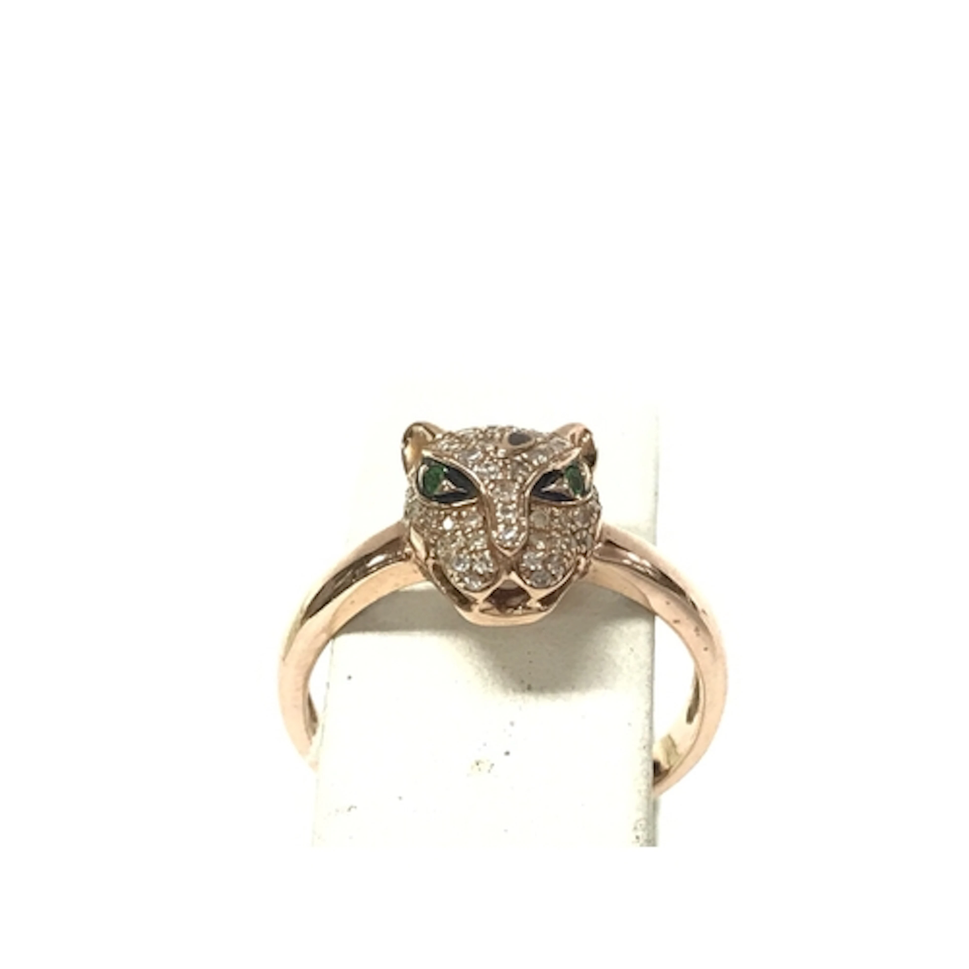 A 14ct gold emerald and diamond Jaguar ring. Size P and 2.81...