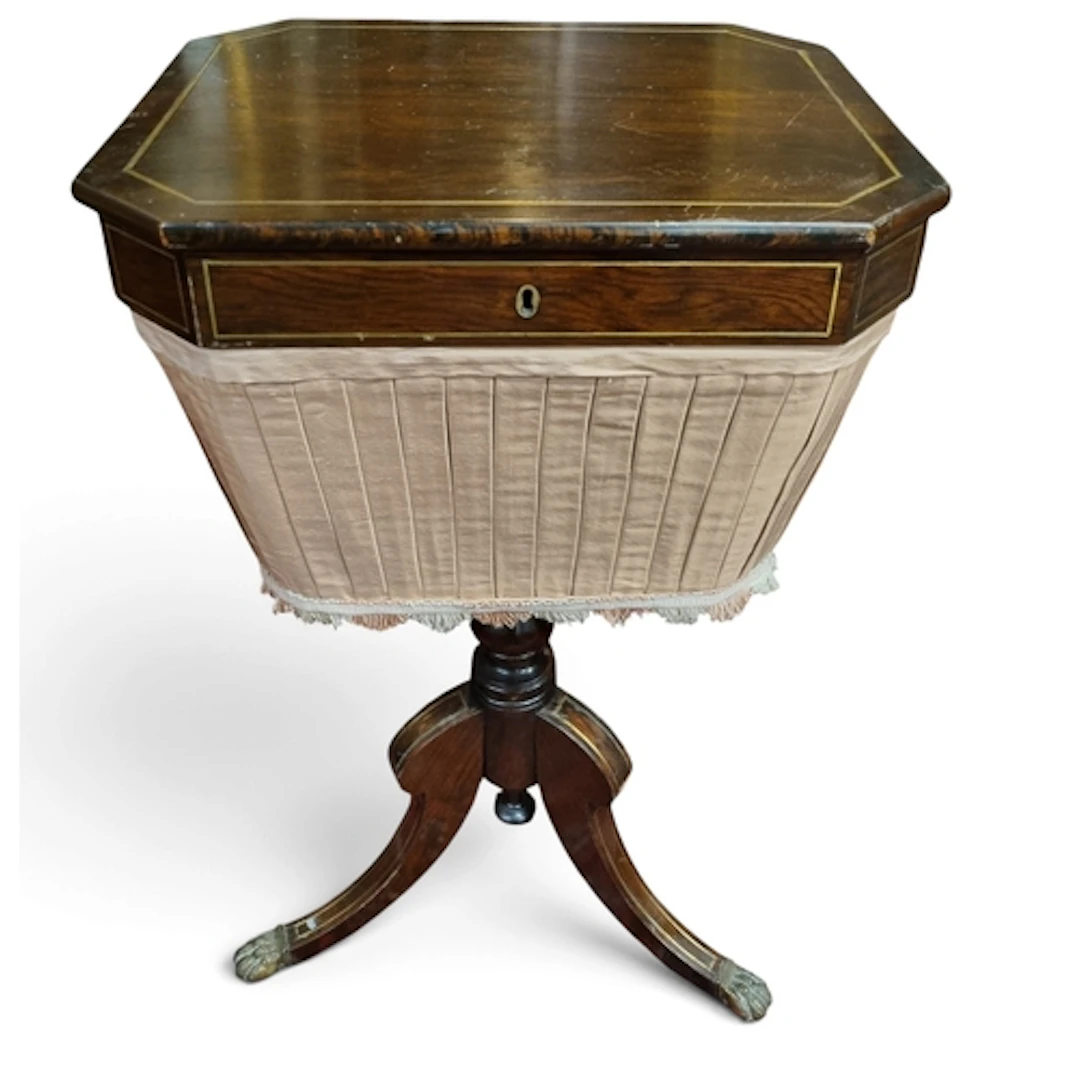 A Regency Rosewood and Brass Inlaid Work Table with fitted i...