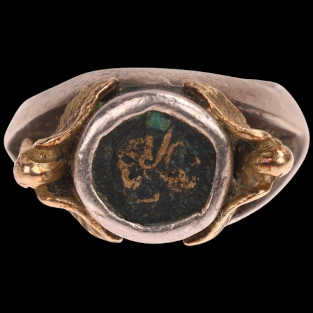 A silver Ancient Greek coin signet ring, centrally set with ...