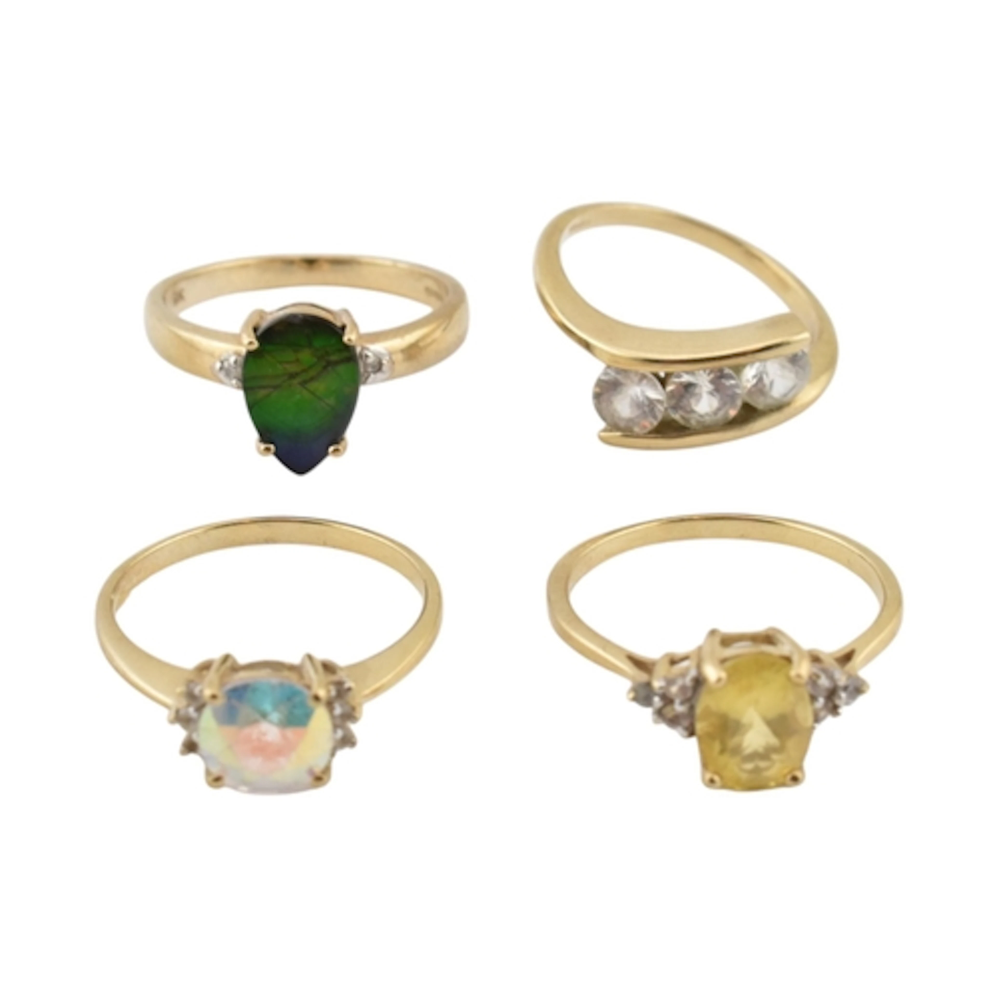 A collection of hallmarked 9ct gold gem set rings. The rings...