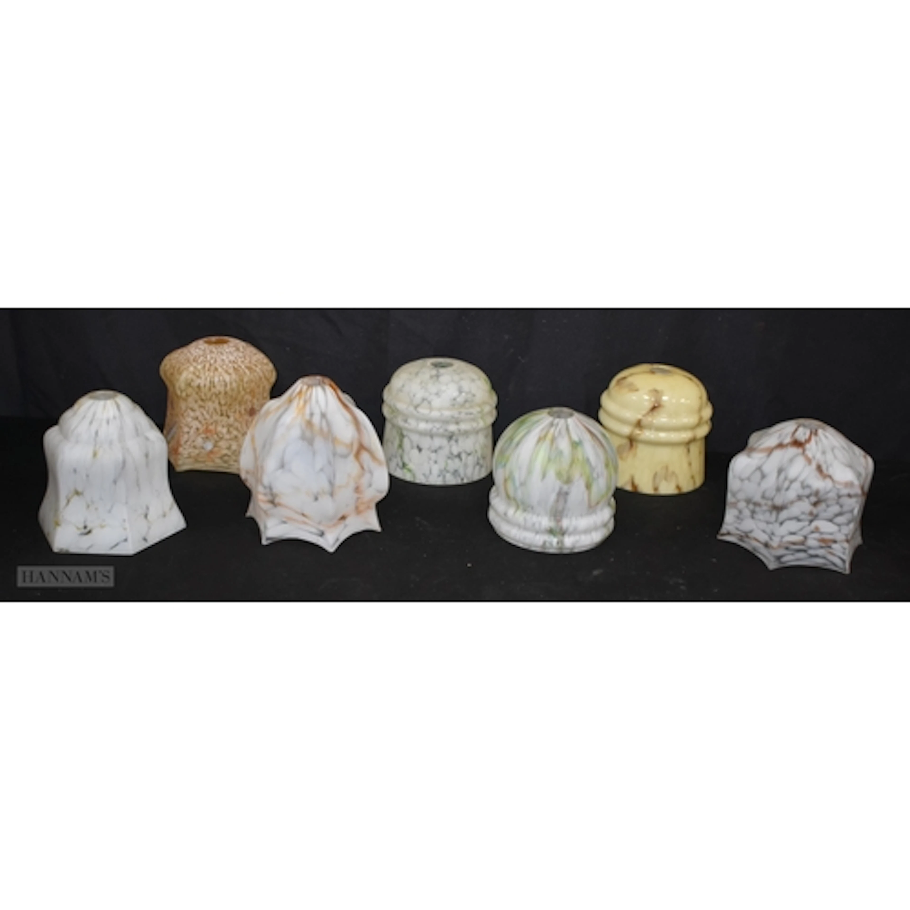 A collection of vintage Art Deco style marbled glass lampsha...
