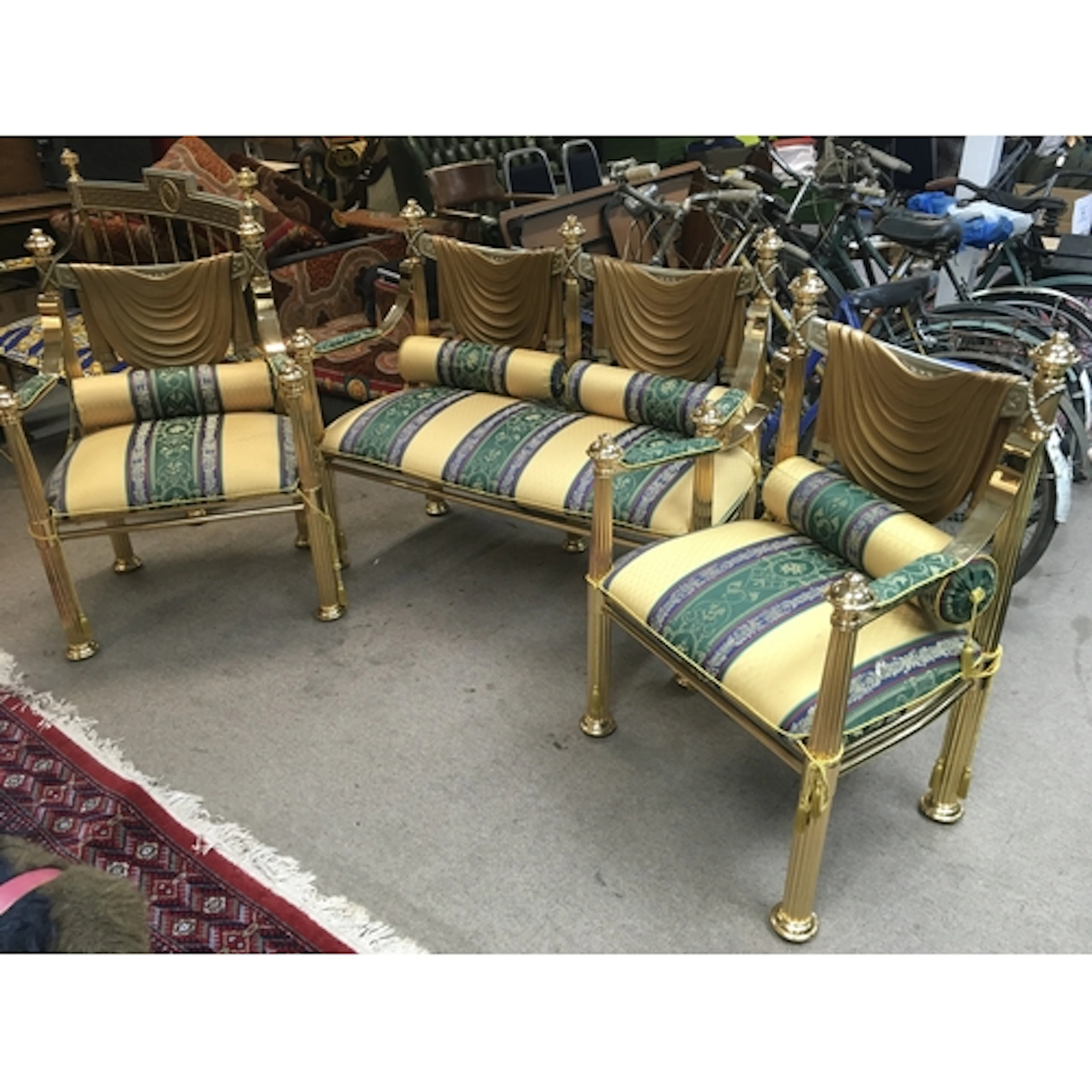 A pair of vintage Versace style gold-tone chairs with green ...