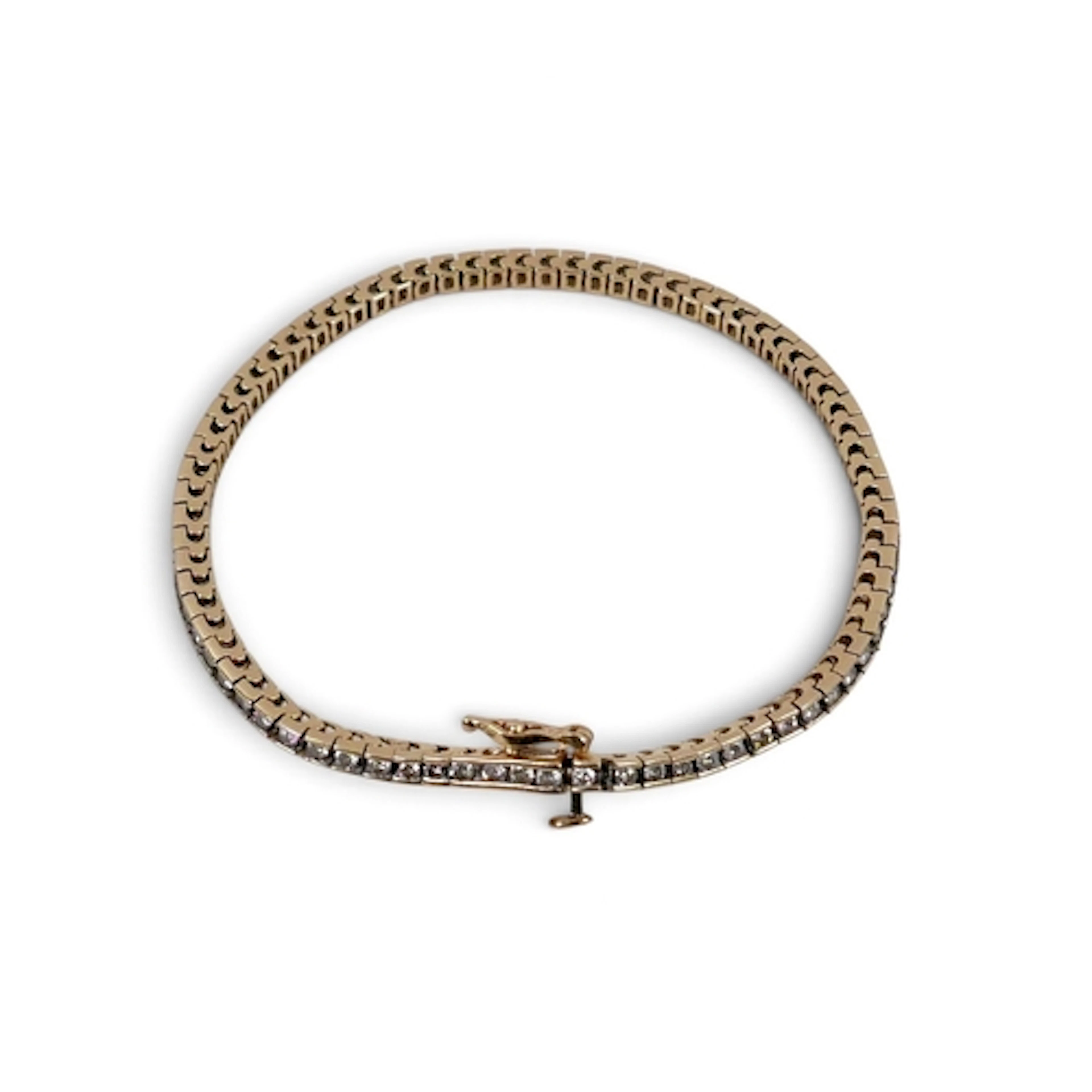 A 14CT GOLD DIAMOND TENNIS BRACELET. 18cm by 2.4mm, 9.4g. Co...
