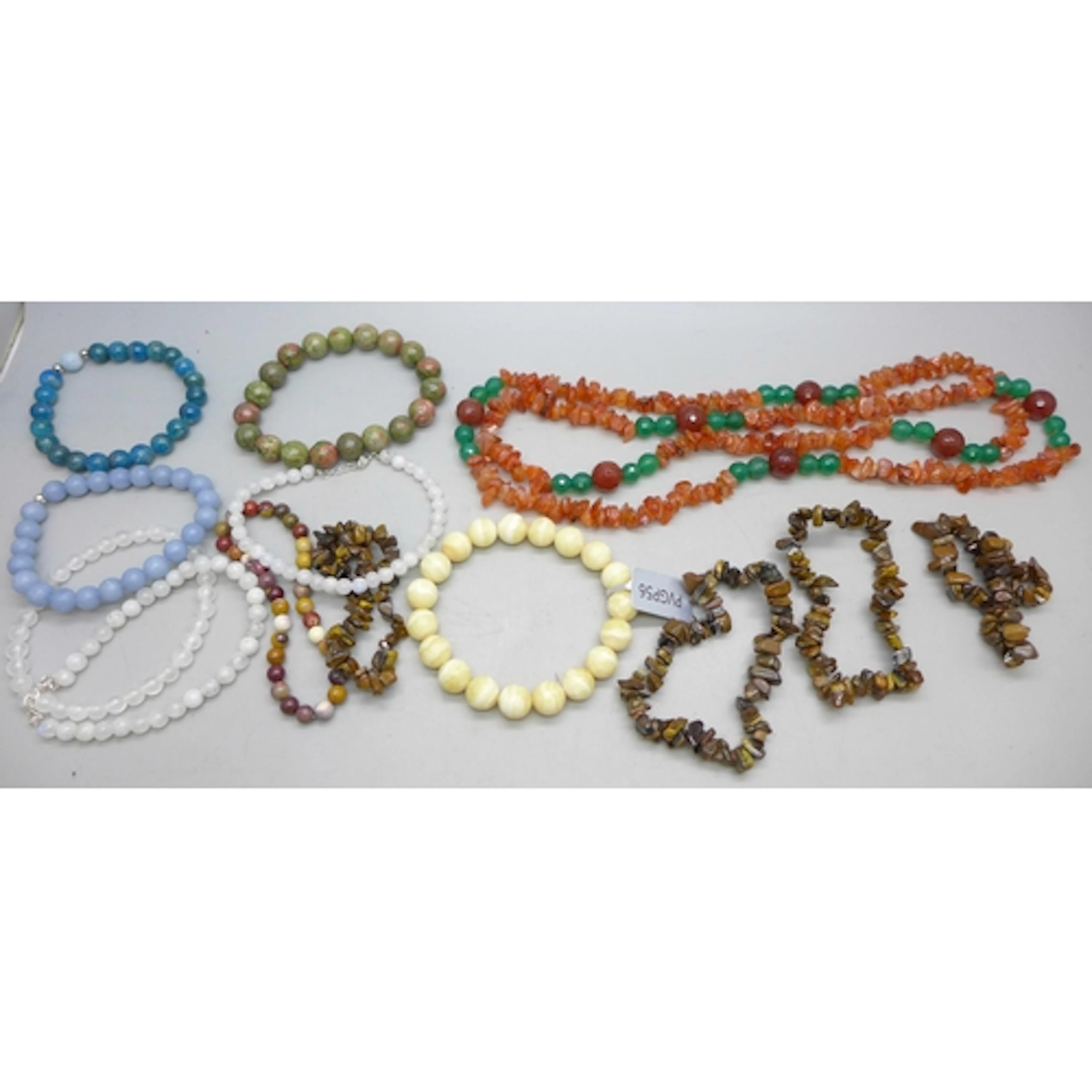 A collection of precious stone jewellery including green aga...