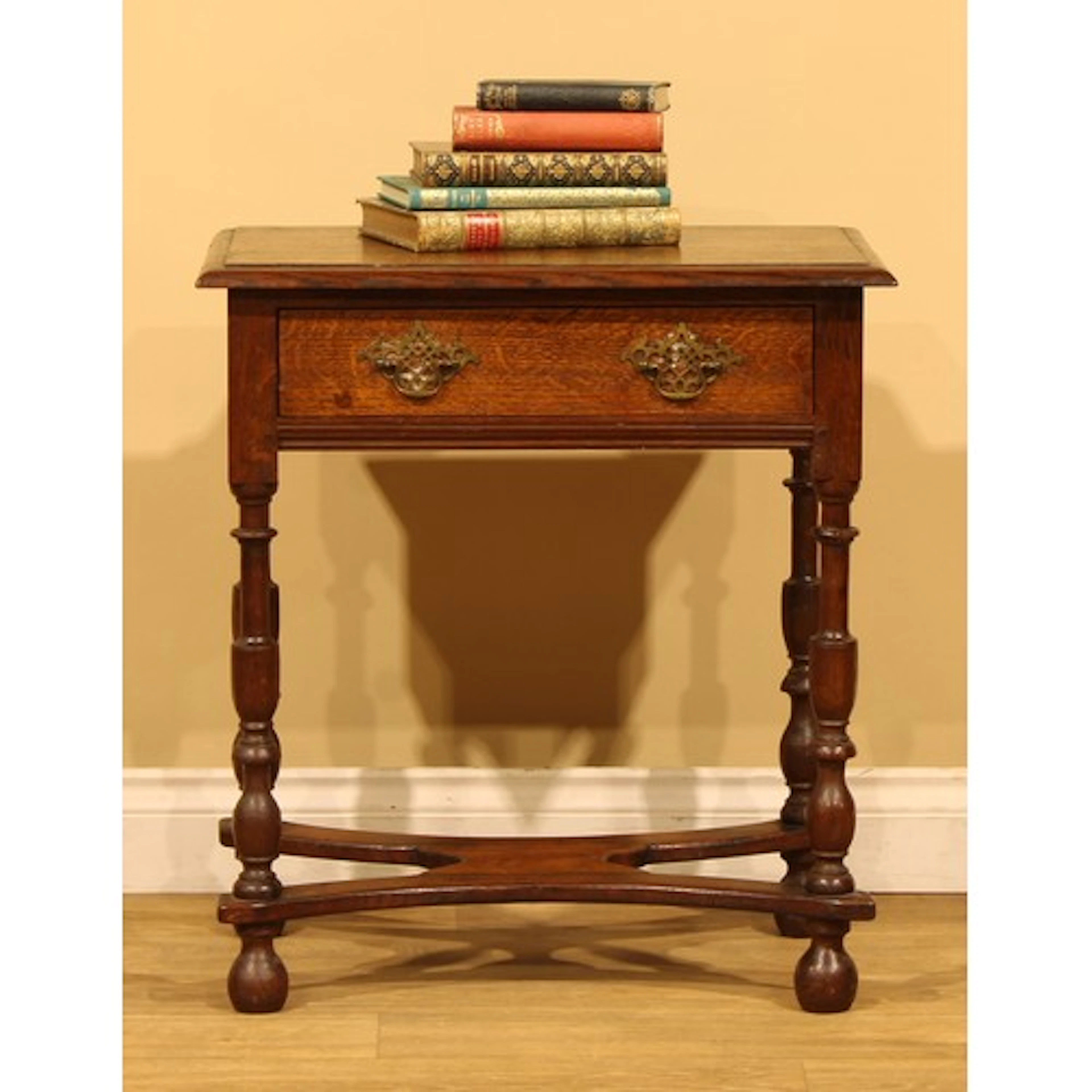 An Arts & Crafts period oak side table, in the 18th century ...